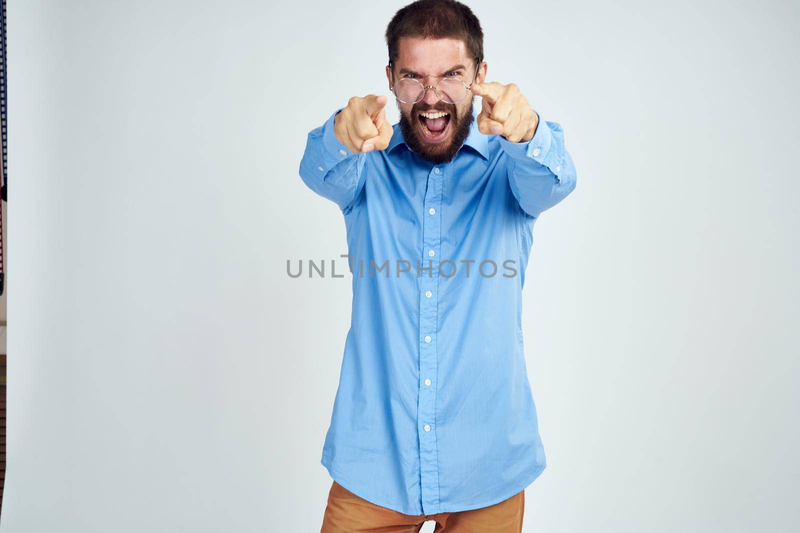 manager wearing glasses posing office work light background. High quality photo