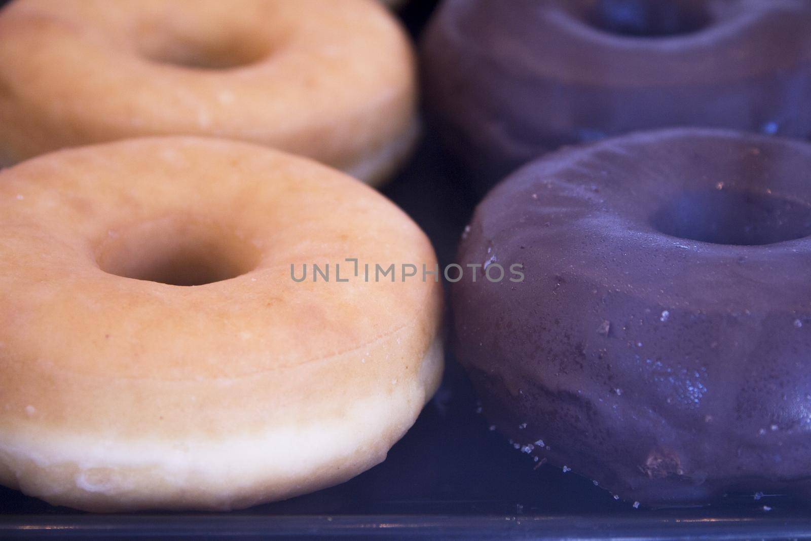 Classic chocolate sugar donuts. No people