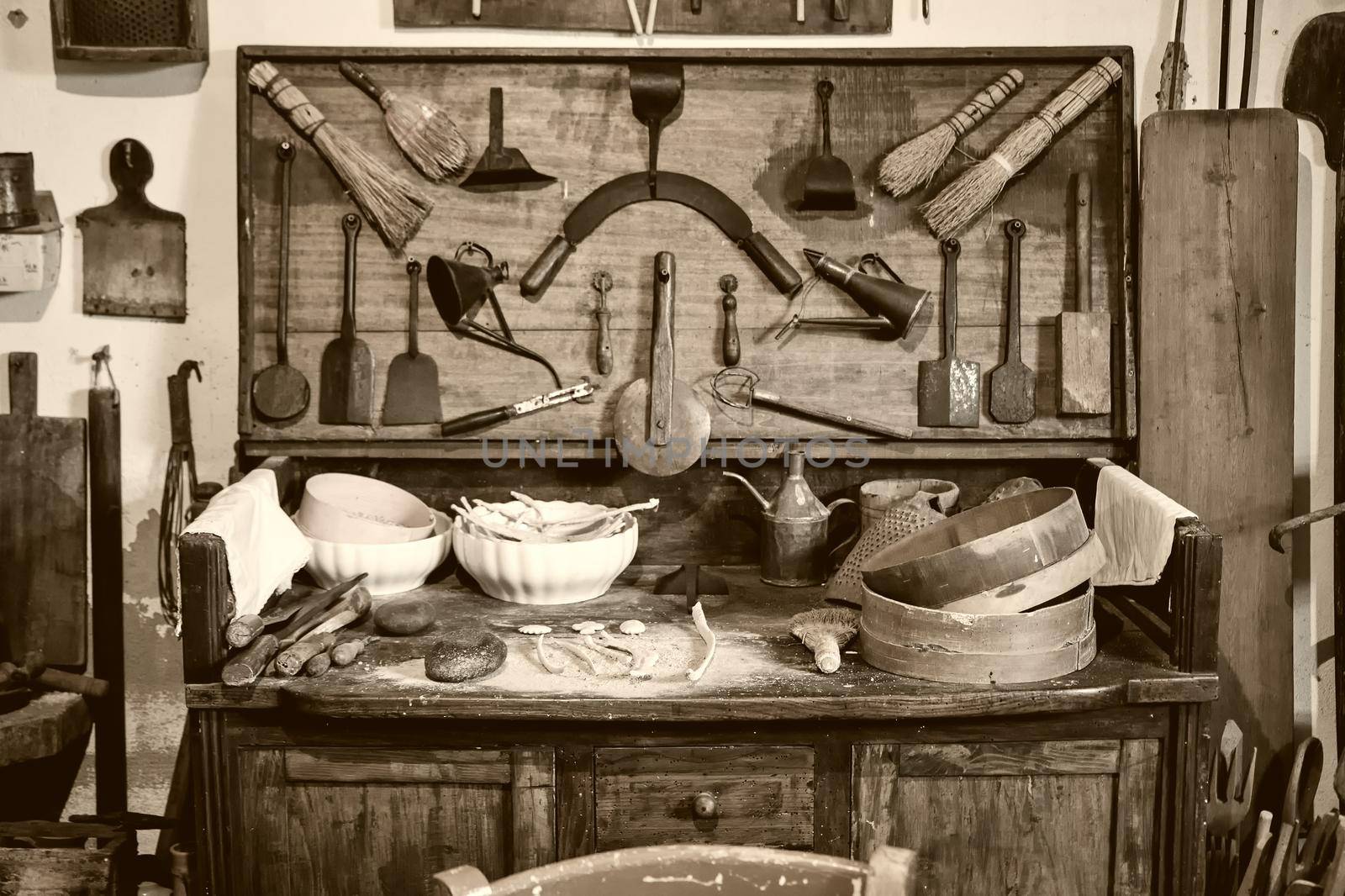vintage photo of kitchen tools (pots, vases, jugs, etc.) and various containers