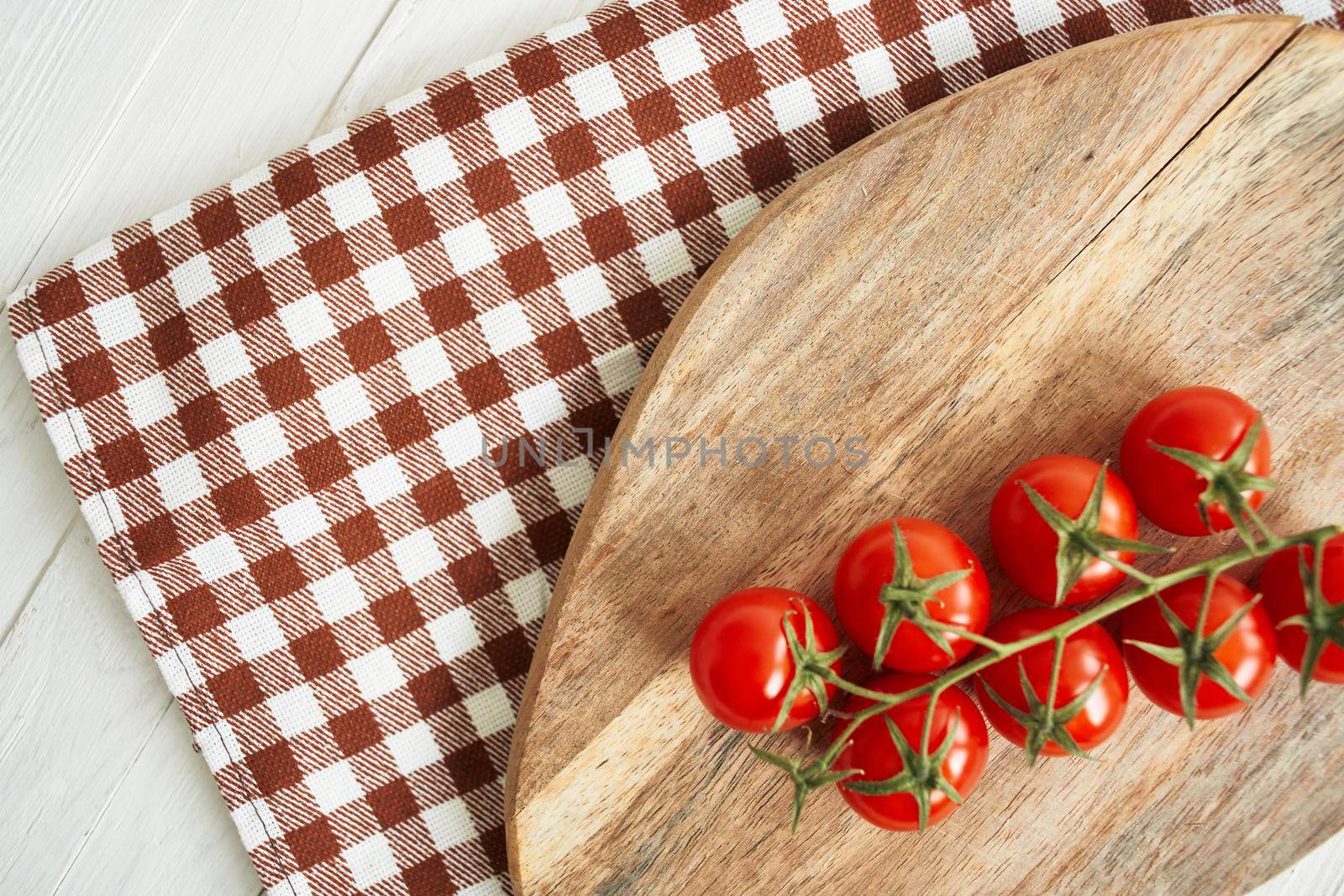 Ingredients wooden board cherry tomatoes organic wood background. High quality photo