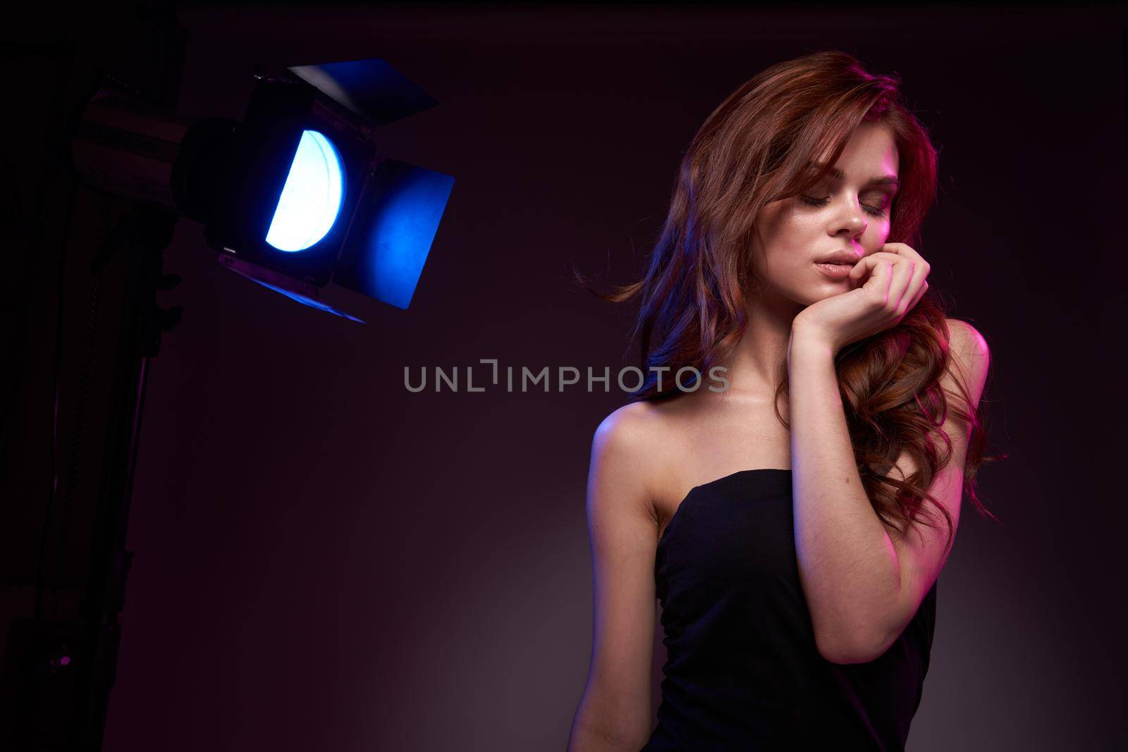 woman model attractive look model photography studio spotlight close-up. High quality photo
