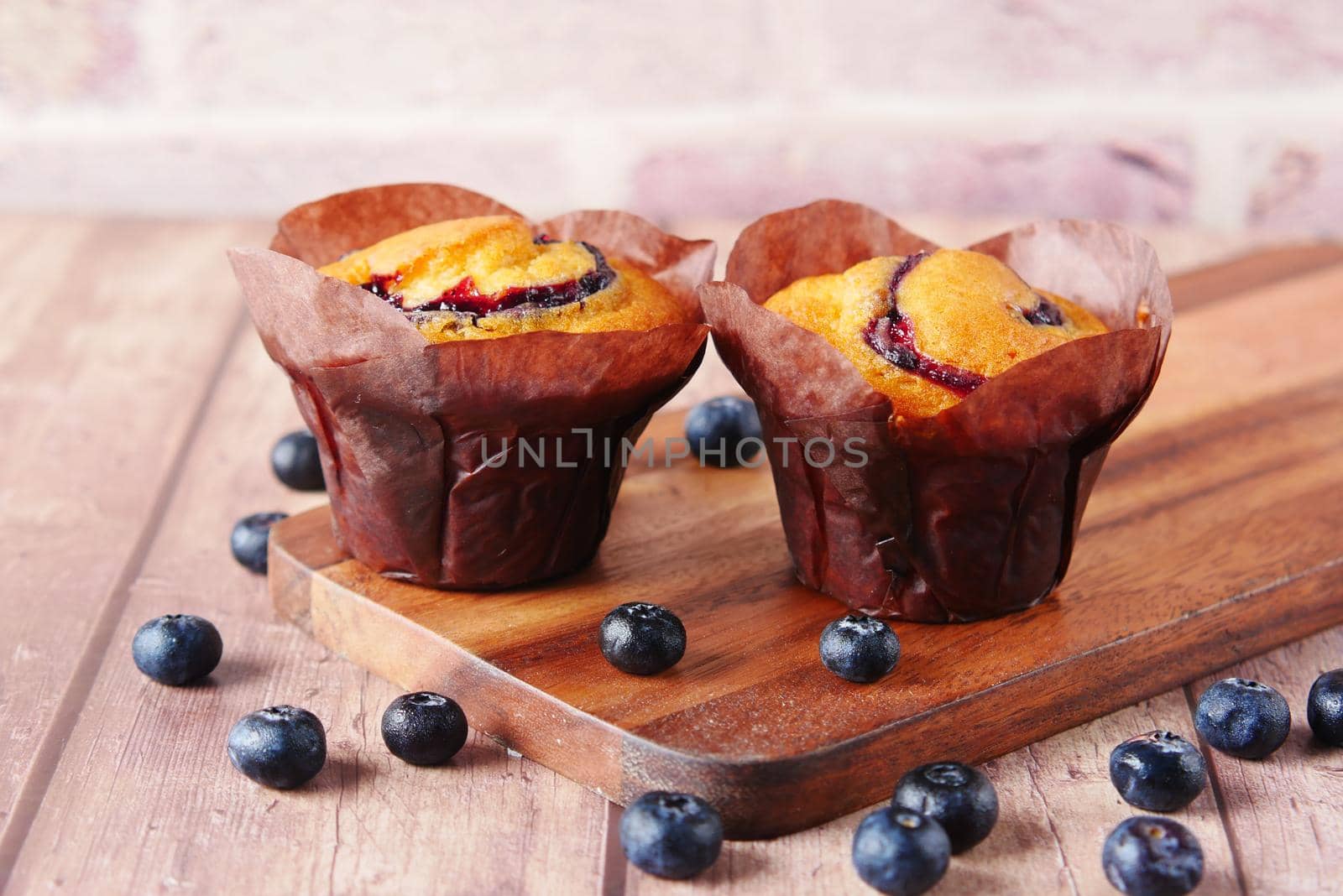 blueberry muffins on table with copy space .