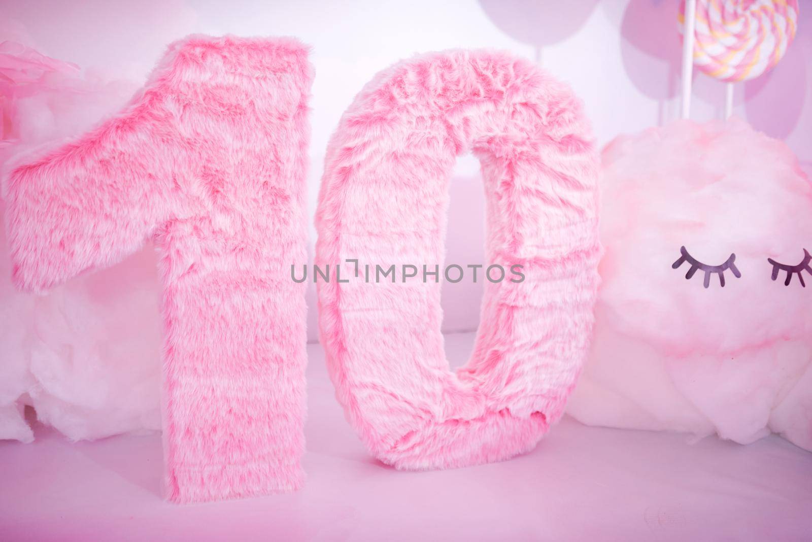 fluffy ten zira with a cloud. Pink tones. 10 Years Party. High quality photo