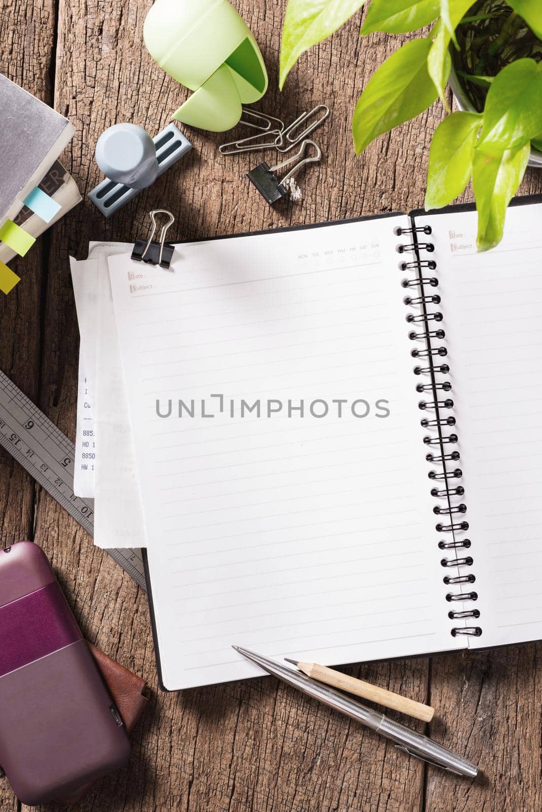 blank notebook on wooden table