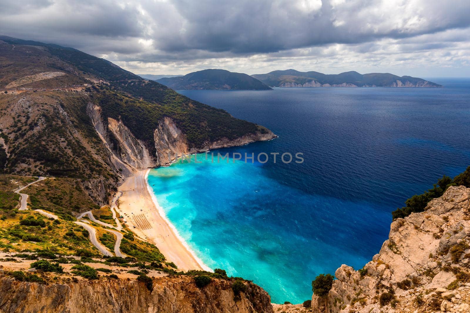 Famous Myrtos beach from overlook, Kefalonia (Cephalonia), Greece. Myrtos beach, Kefalonia island, Greece. Beautiful view of Myrtos beach, Ionian Island, Kefalonia (Cephalonia), Greece.