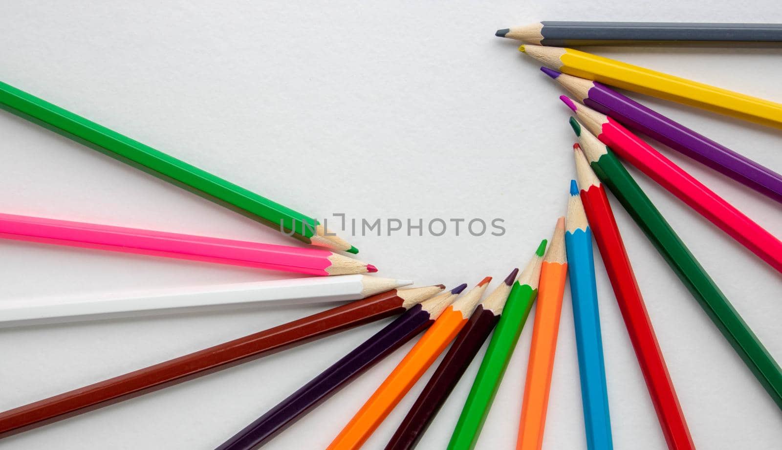Colour pencils isolated on white background close up by lapushka62