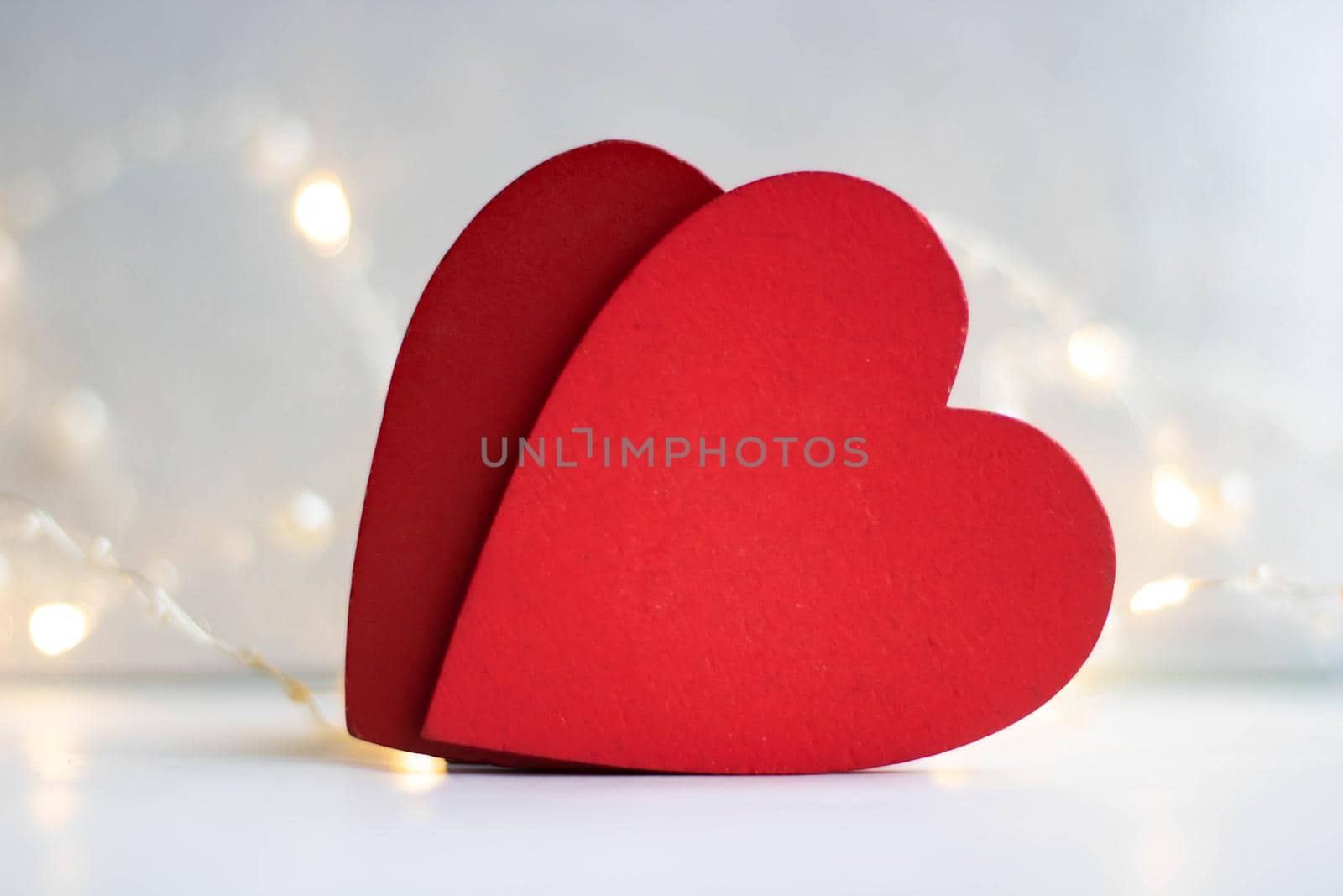 Decorative wooden red hearts on a white background. Valentine's day, Mother's Day, March 8, Family Day or the concept of love
