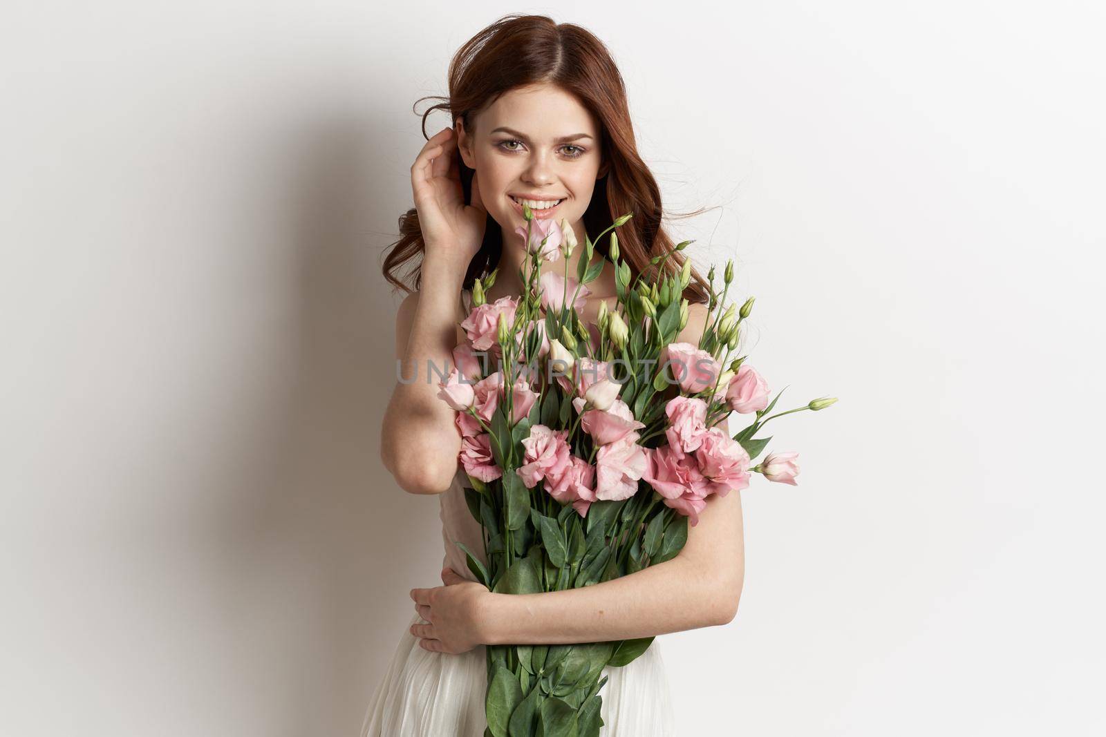 cheerful woman with a bouquet of flowers lifestyle glamor by Vichizh