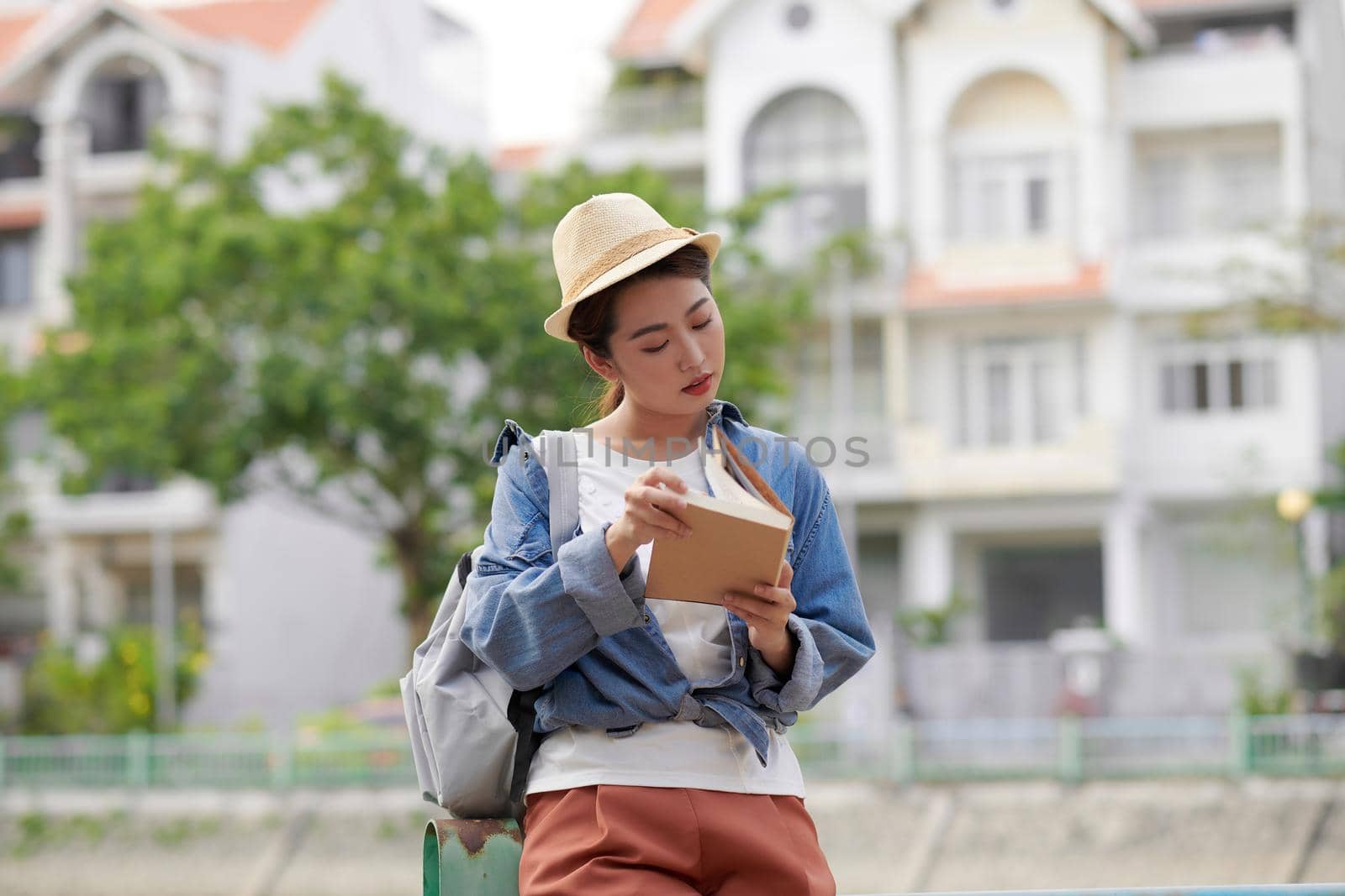  Female college student relax and enjoy outdoor lifestyle activity in summer day