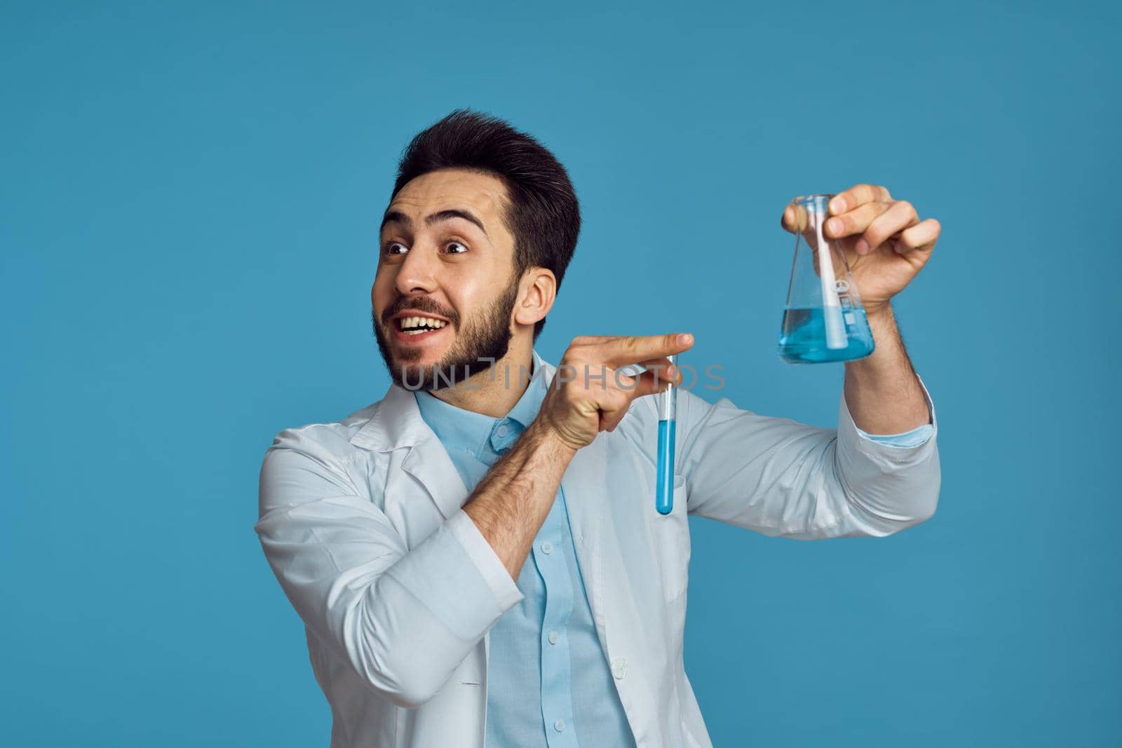 laboratory assistant in a white apron analyzes diagnostics. High quality photo