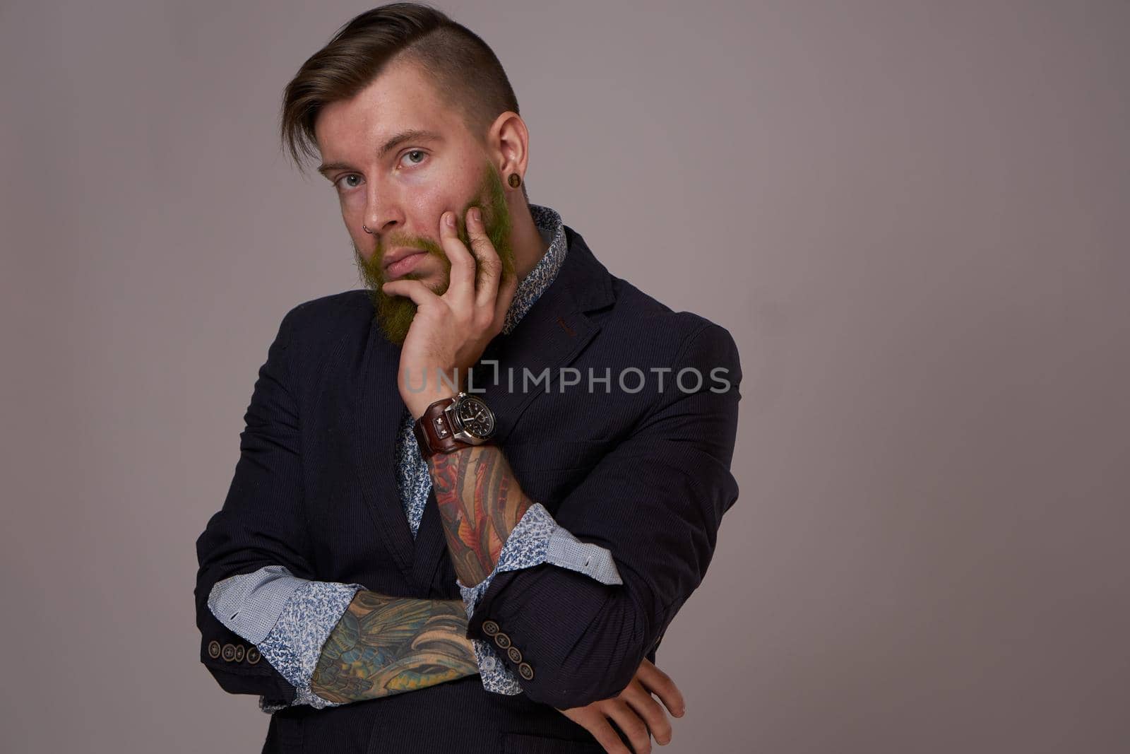 bearded man in jacket posing fashion Professional. High quality photo