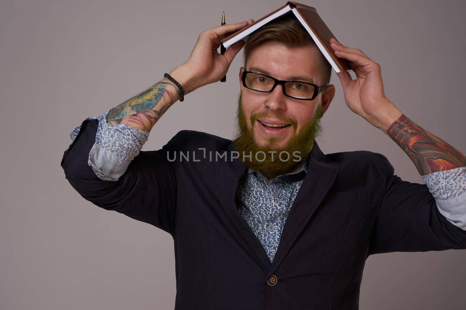 business man with a book in his hands job manager professionals. High quality photo