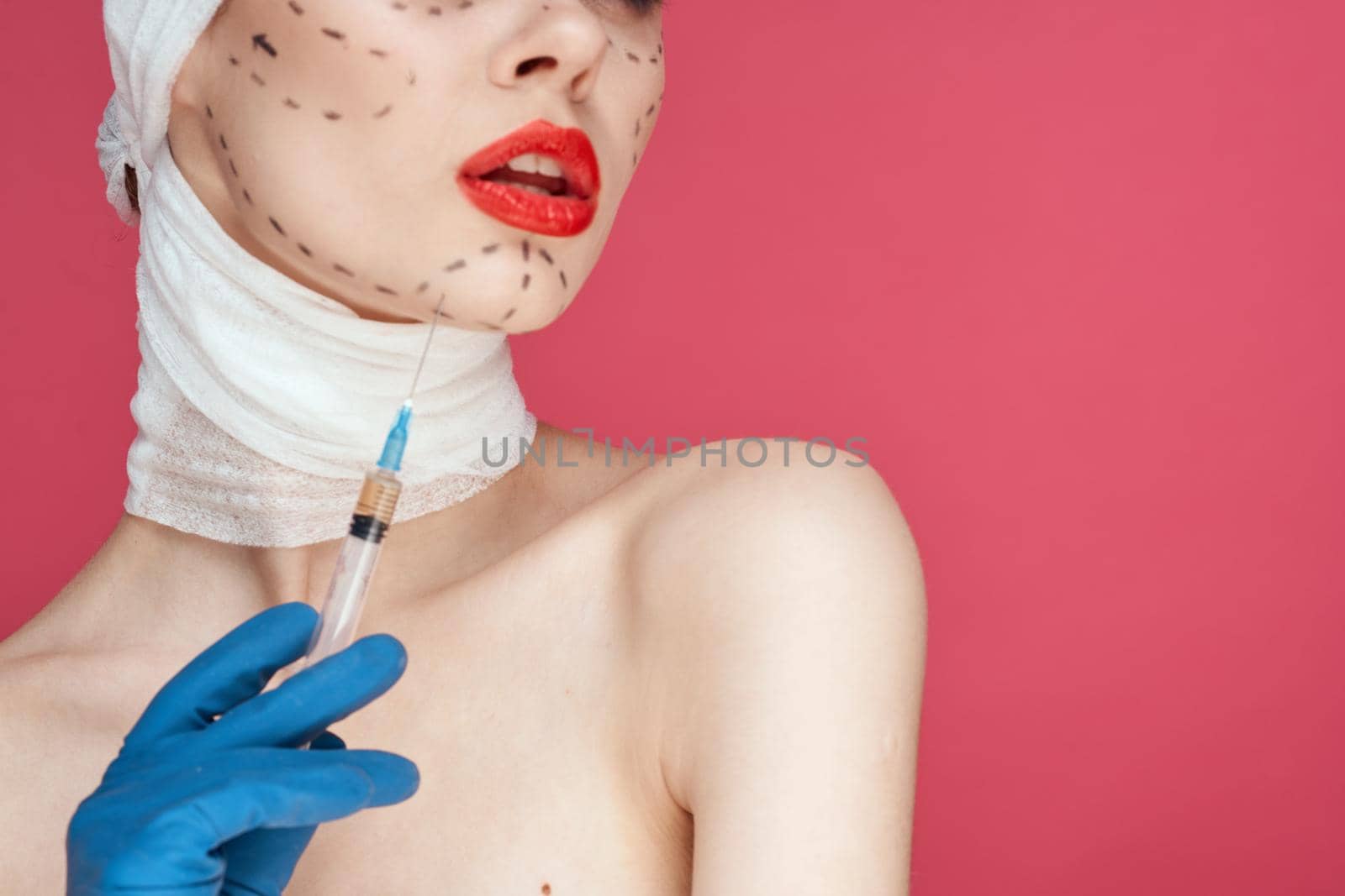 female patient rejuvenation facial injection cosmetic procedures pink background by Vichizh