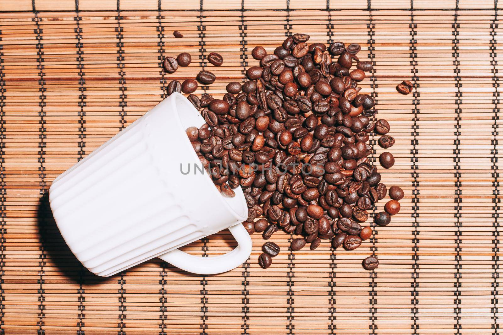 a cup of coffee brown mocha beans view from above by Vichizh