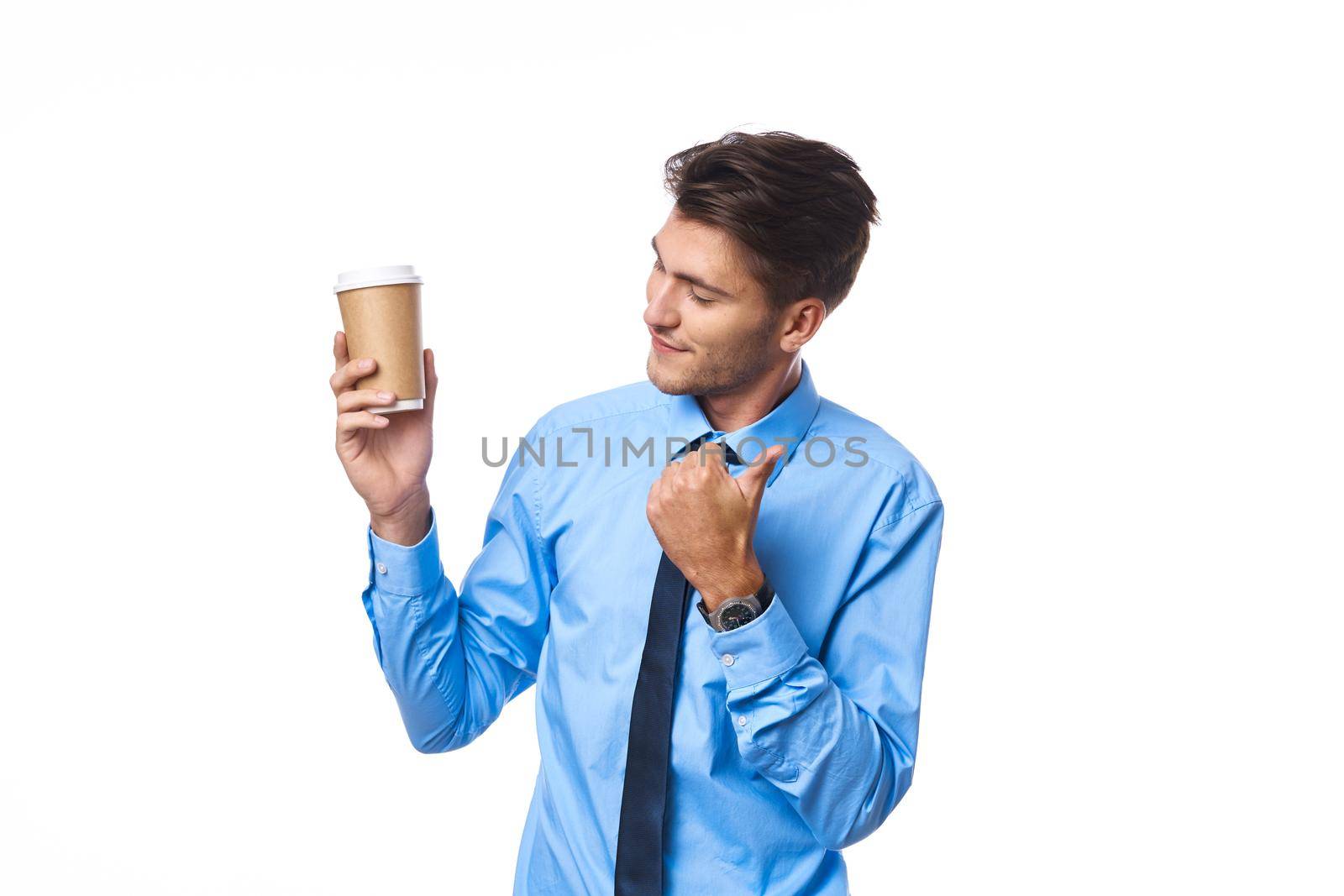 businessmen communication on the phone a cup of coffee light background. High quality photo