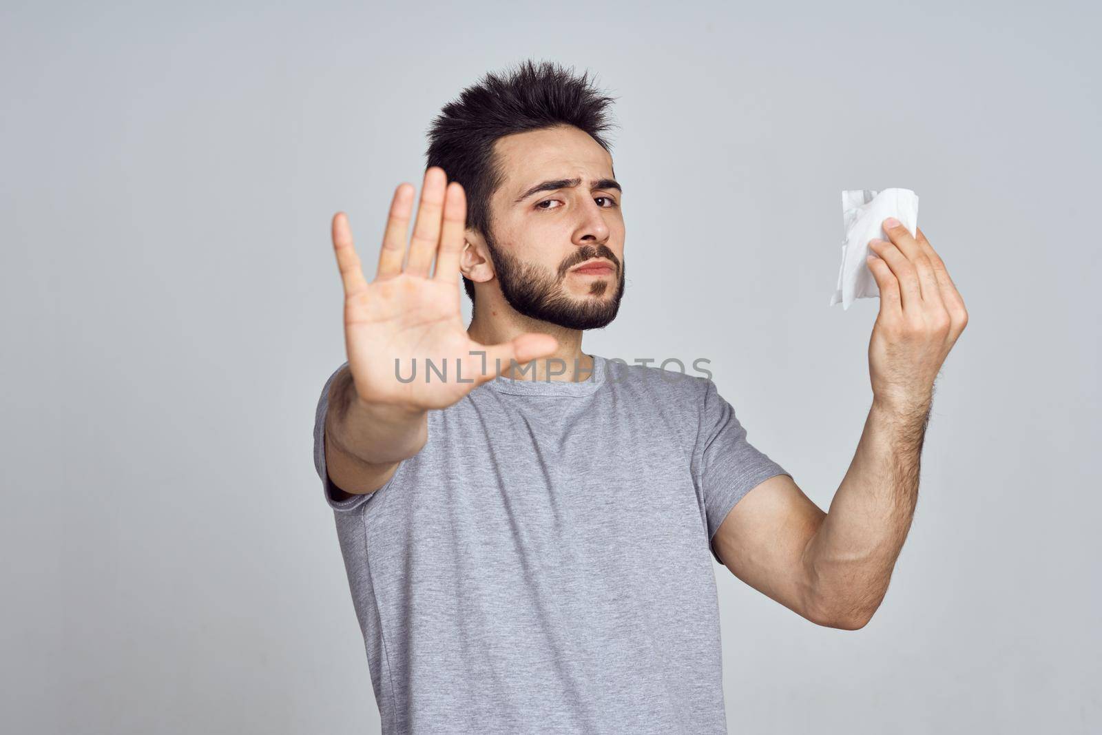 bearded man in white t-shirt posing gesturing with his hands by Vichizh