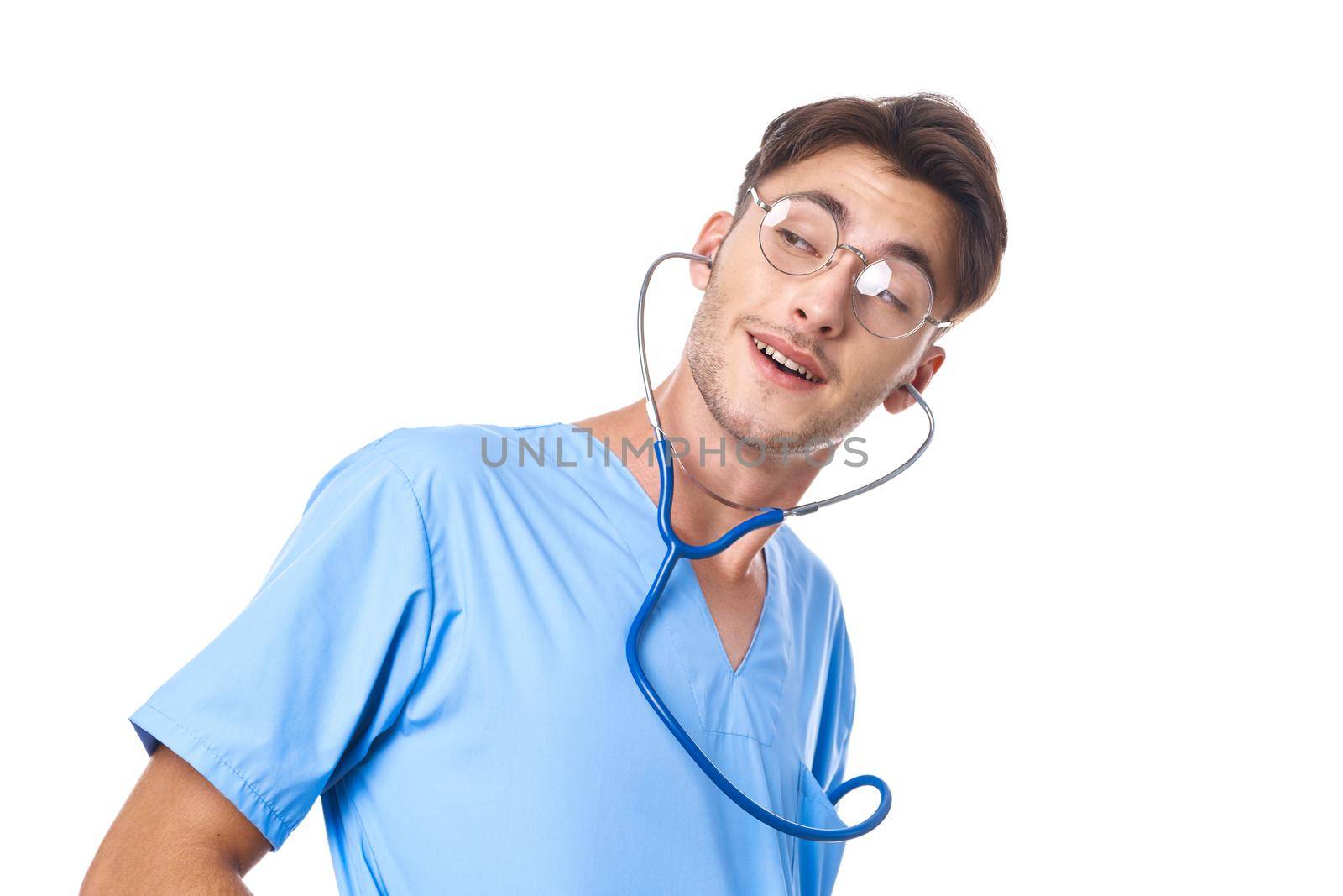 male doctor health care treatment stethoscope examination studio lifestyle. High quality photo