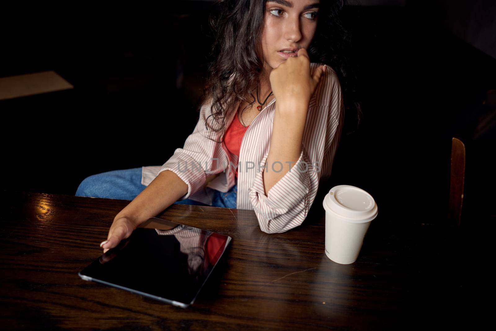 woman with tablet cafe communication internet device. High quality photo