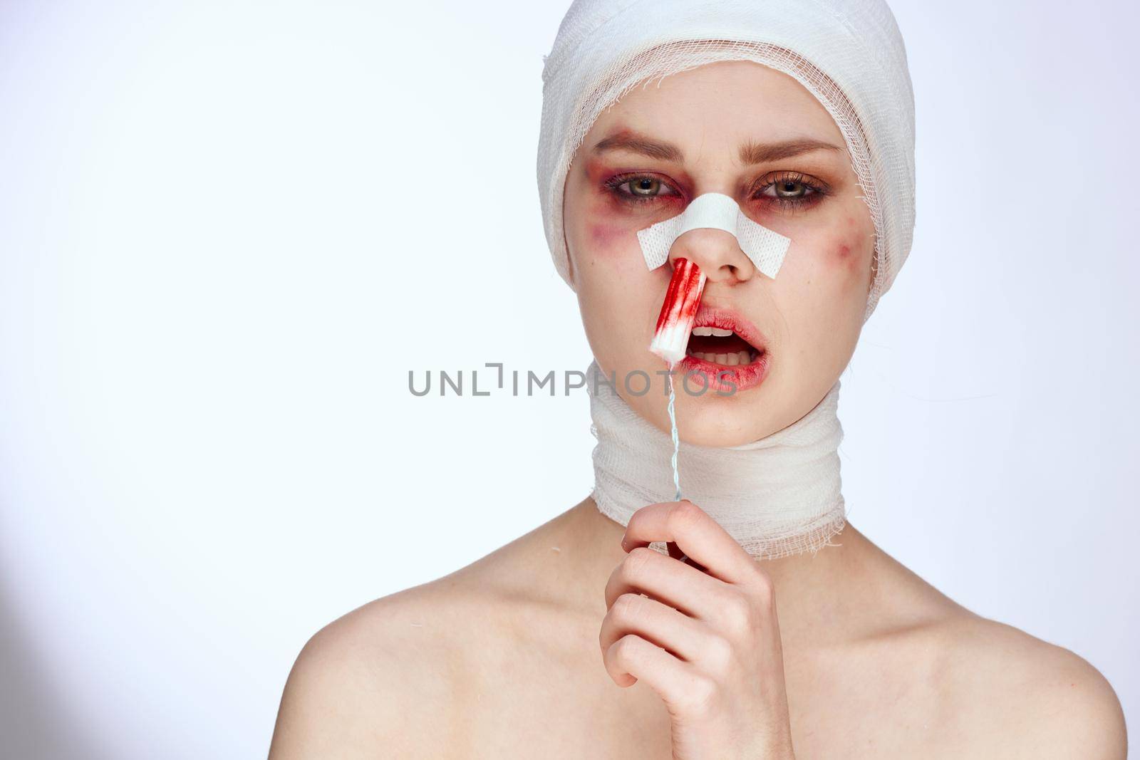 emotional woman plastic surgery operation bare shoulders isolated background. High quality photo