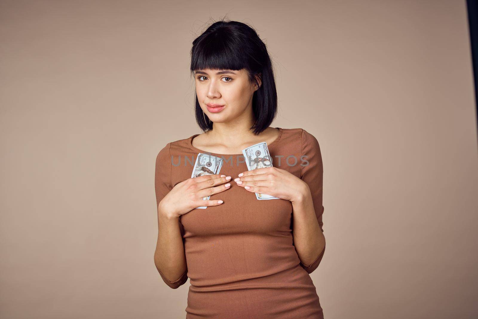 emotional woman with money in hands finance positive. High quality photo