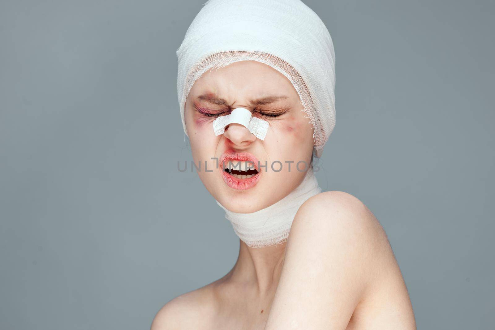 female patient medicine treatment injury isolated background. High quality photo