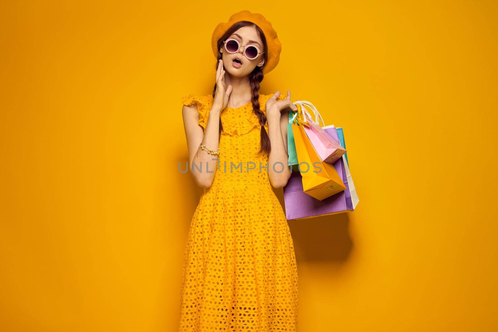 smiling woman wearing sunglasses posing shopping fashion isolated background. High quality photo