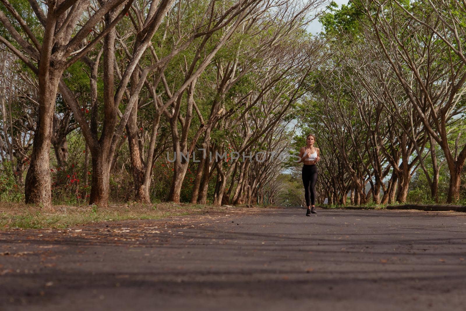 beautiful girl runs into the autumn. bali