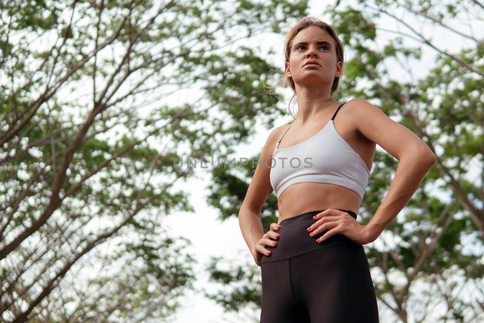 woman warm up in the autumn forest. bali