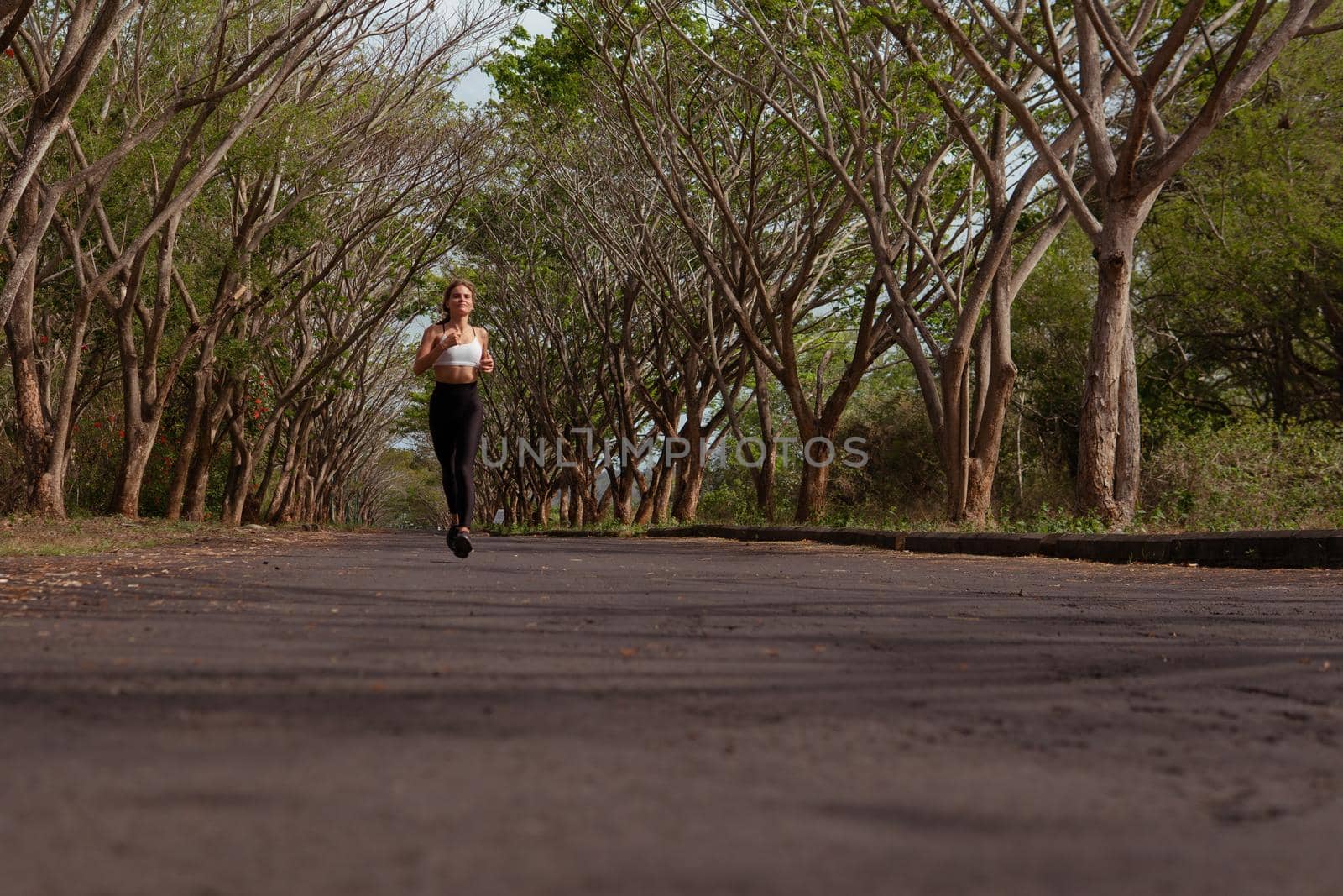 beautiful girl runs into the autumn. bali