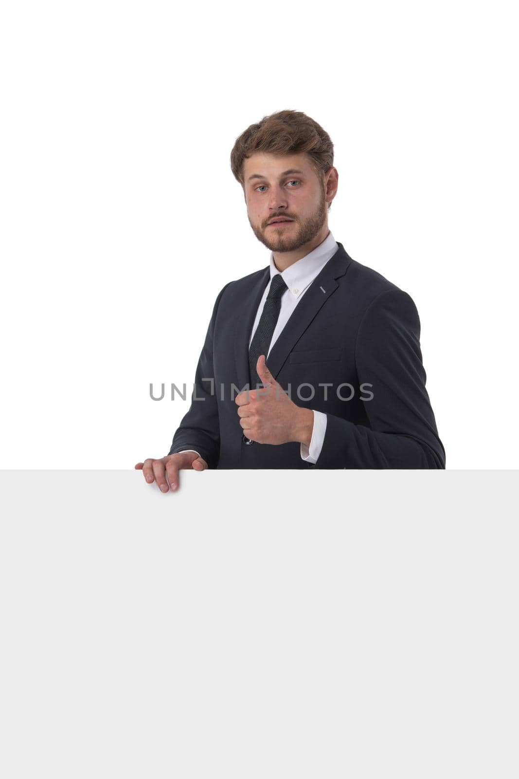 Business man displaying a banner ad isolated over a white background