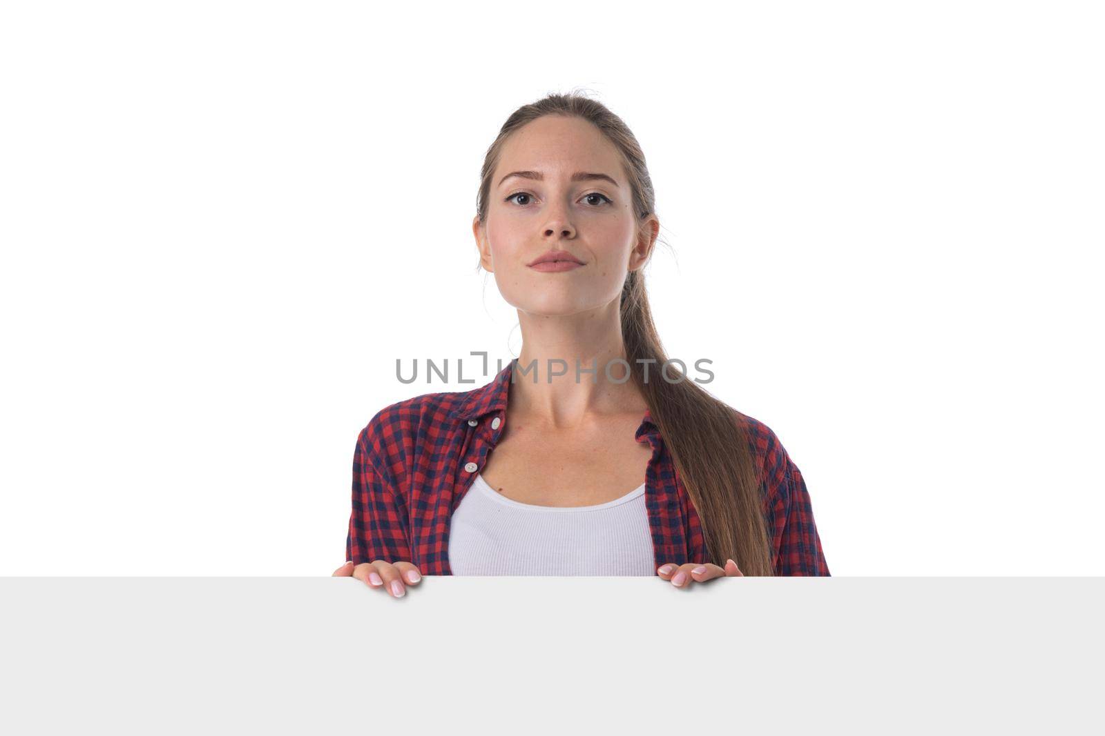 Young woman holding blank poster isolated on white background