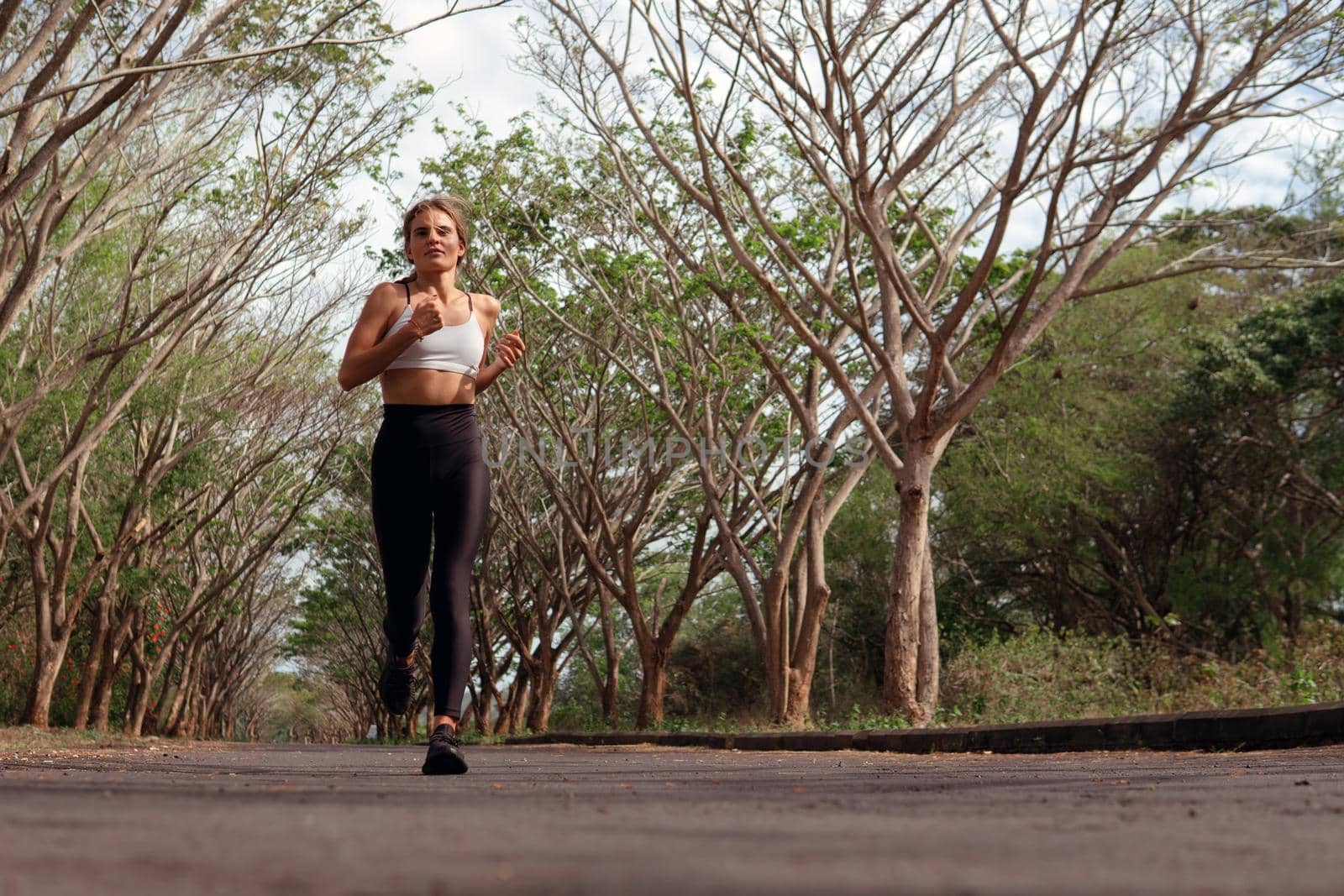 beautiful girl runs into the autumn. bali