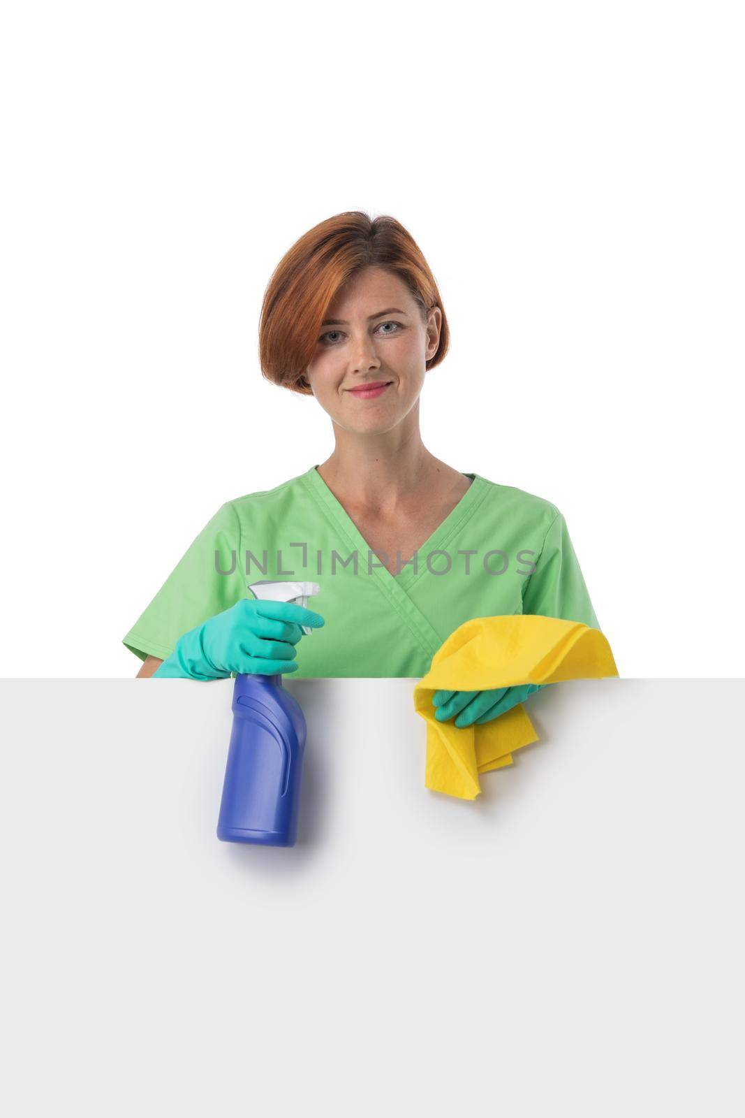 A woman cleaning lady with a rag in her hand holds an air freshener spray. House cleaning concept. Blank banner, isolated on white background
