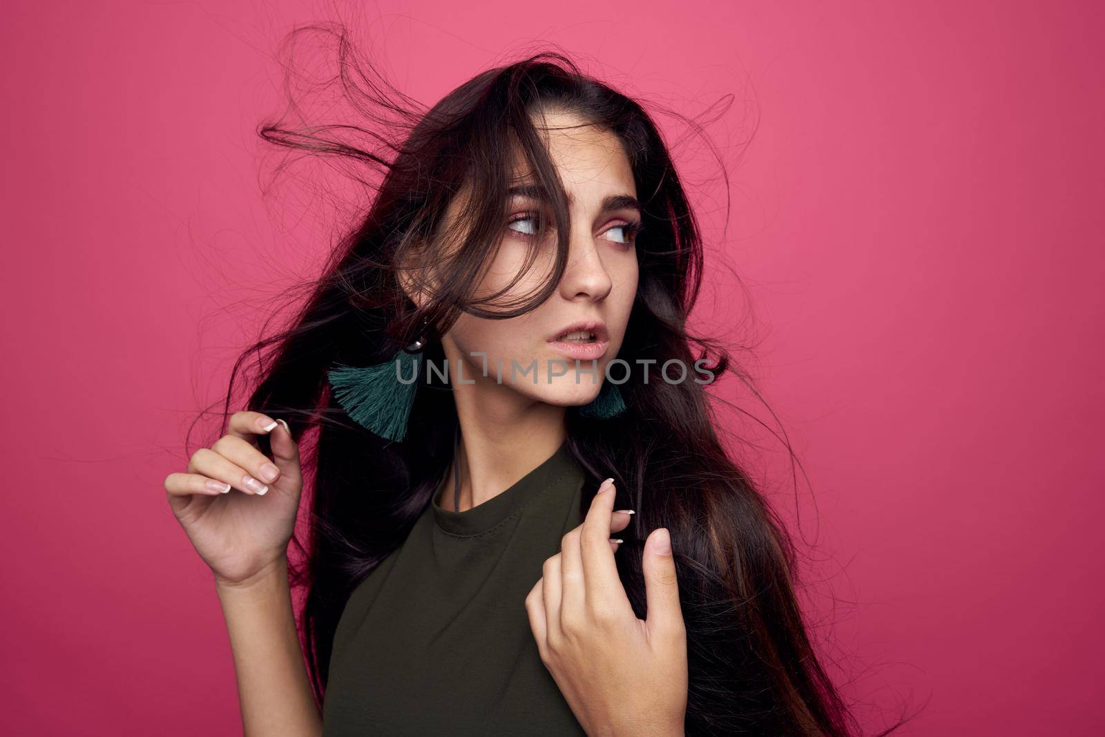 beautiful woman fashion clothing posing pink background by Vichizh