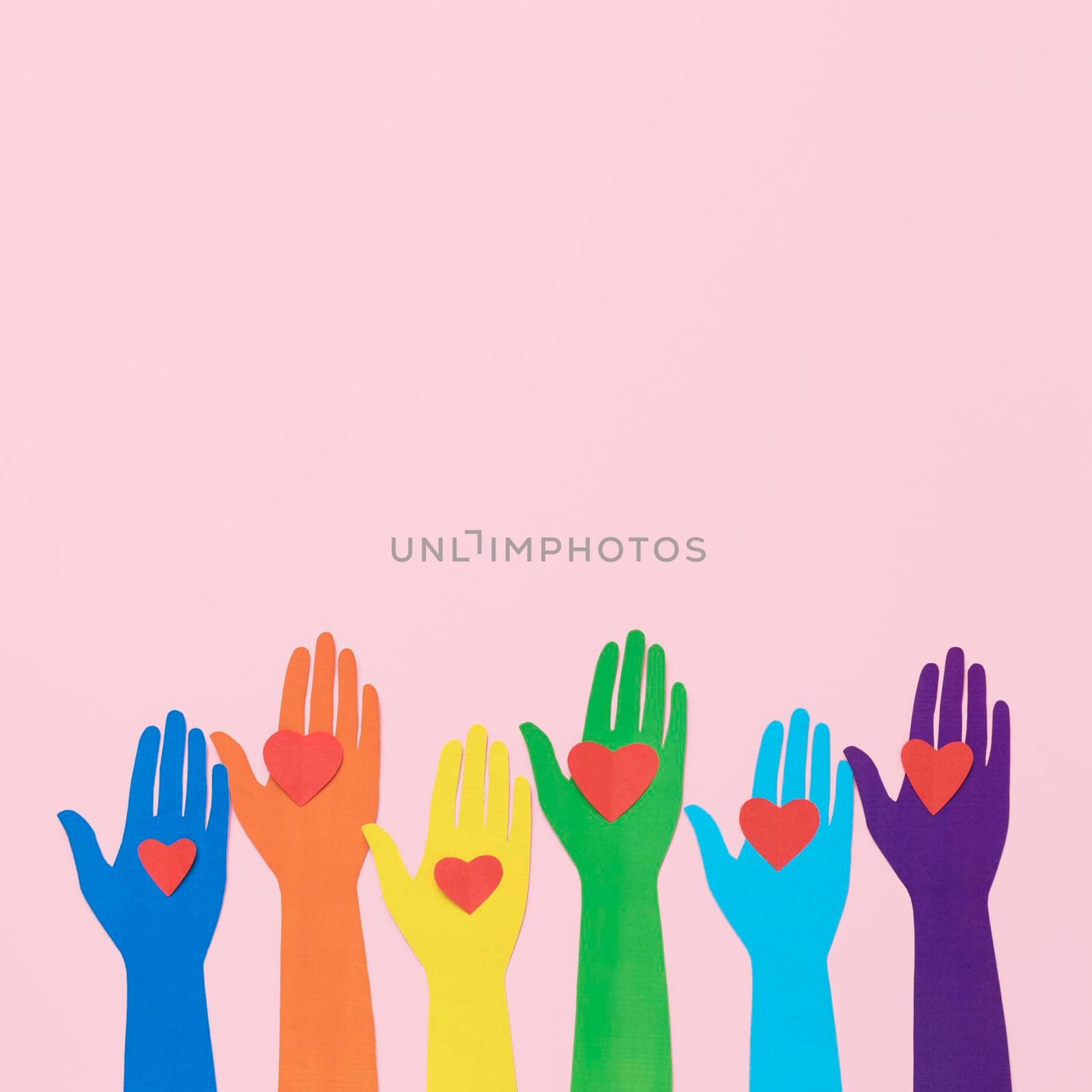 top view diversity composition different colored paper hands with copy space. High quality photo by Zahard