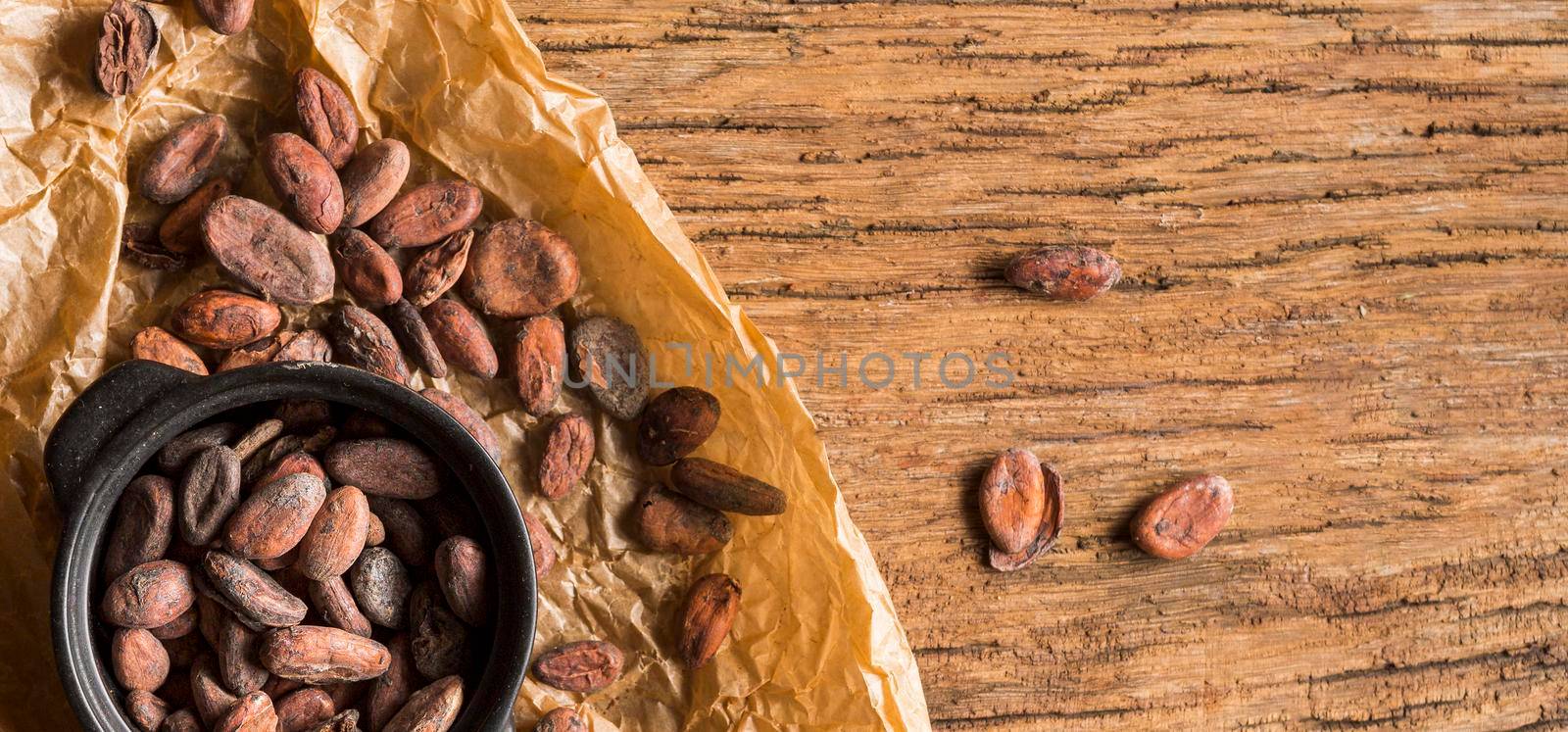 flat lay cocoa beans pot. High resolution photo