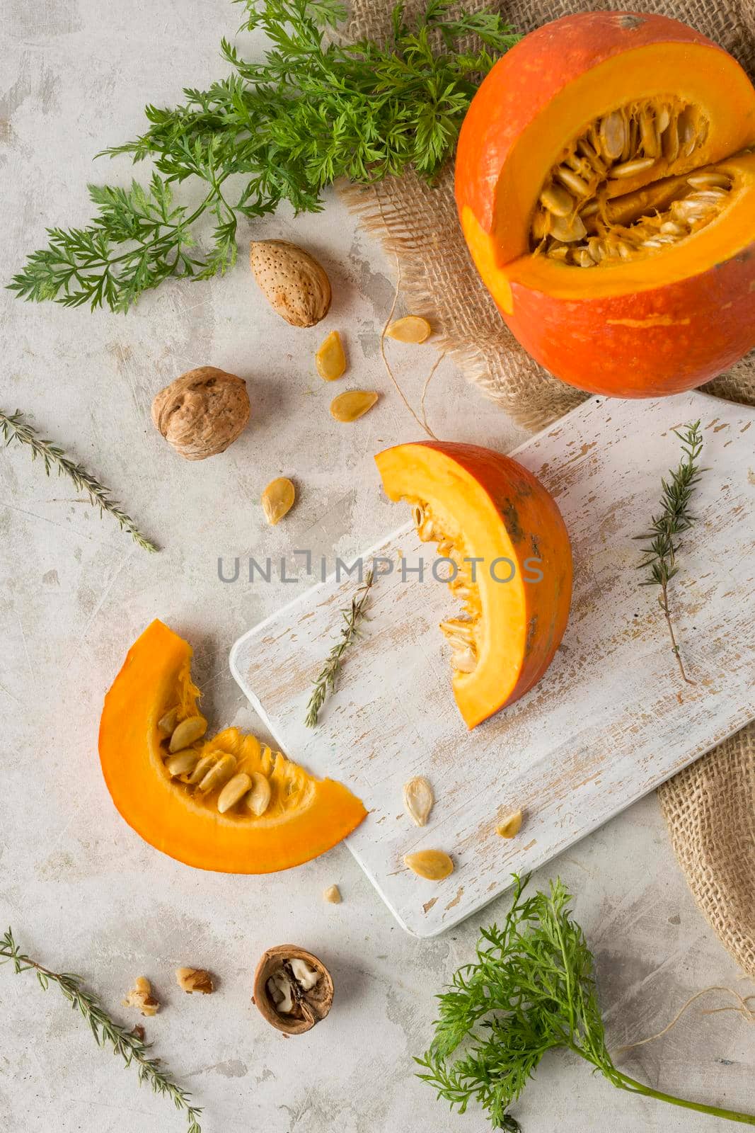 top view pumpkin slice wooden board. High resolution photo