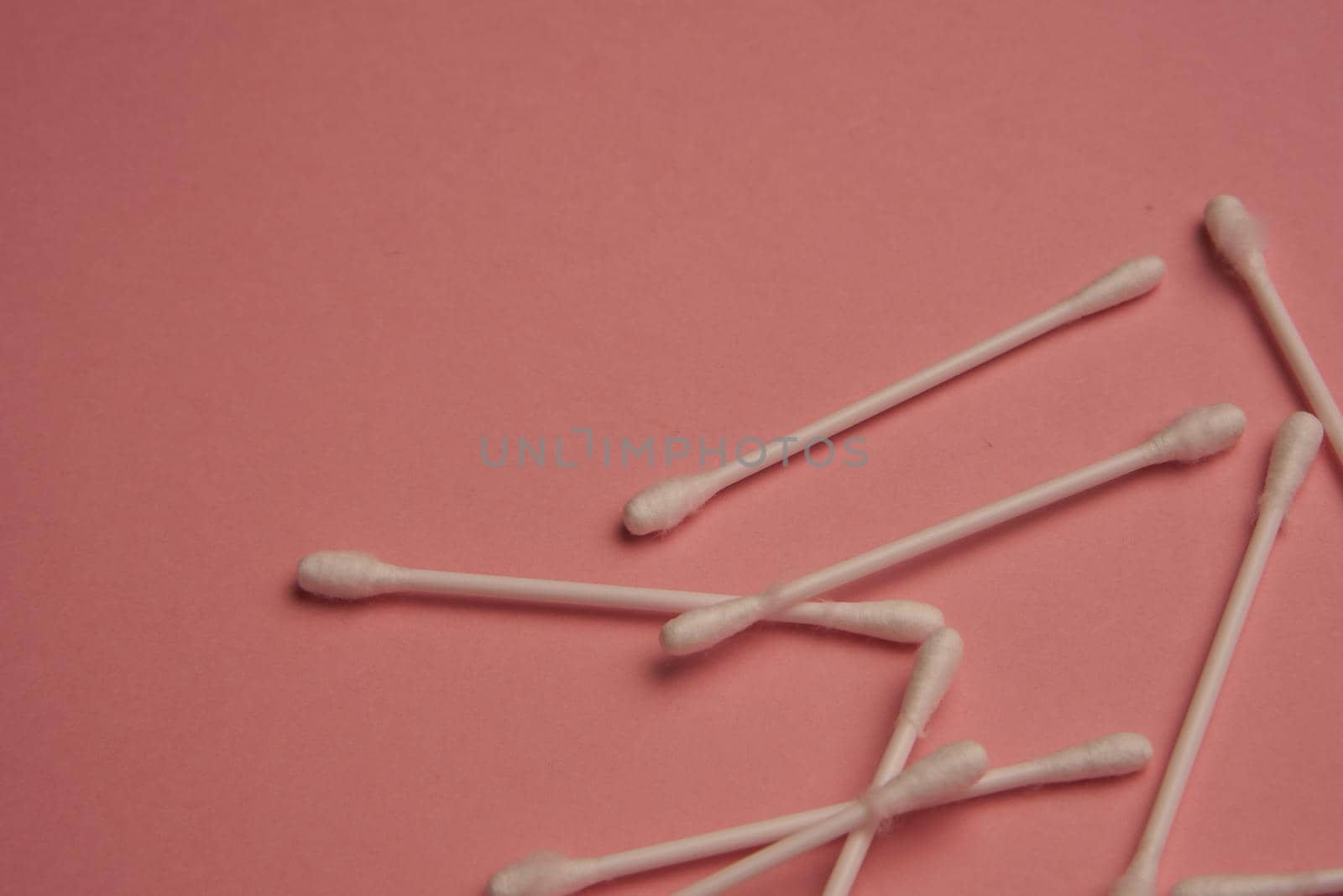 cotton swabs hygiene protection sanitation pink background. High quality photo