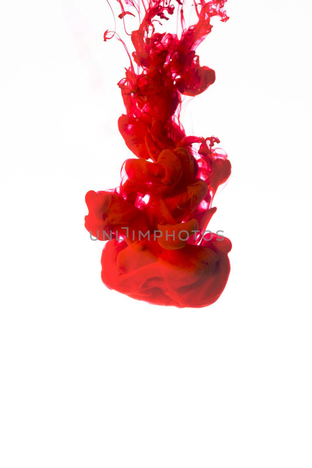 vivid red droplet ink. High resolution photo
