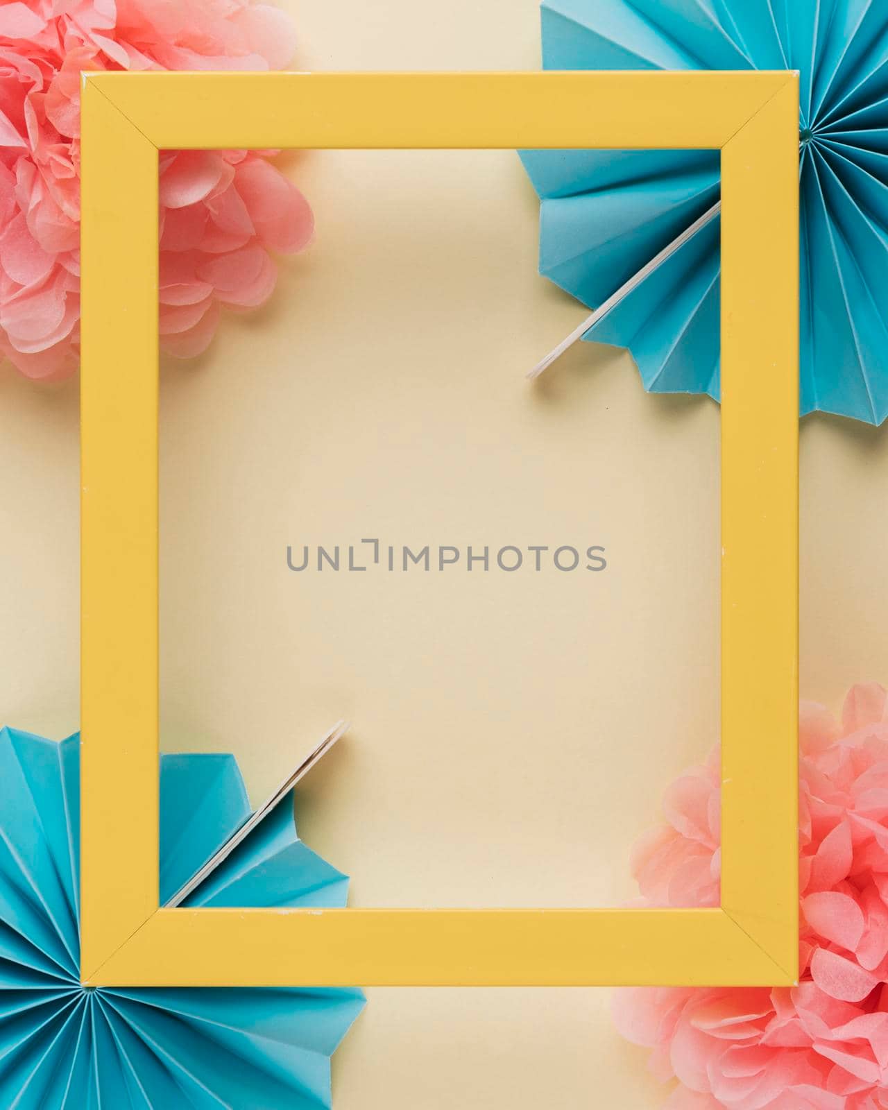 yellow wooden border frame paper flower beige backdrop. High quality photo by Zahard