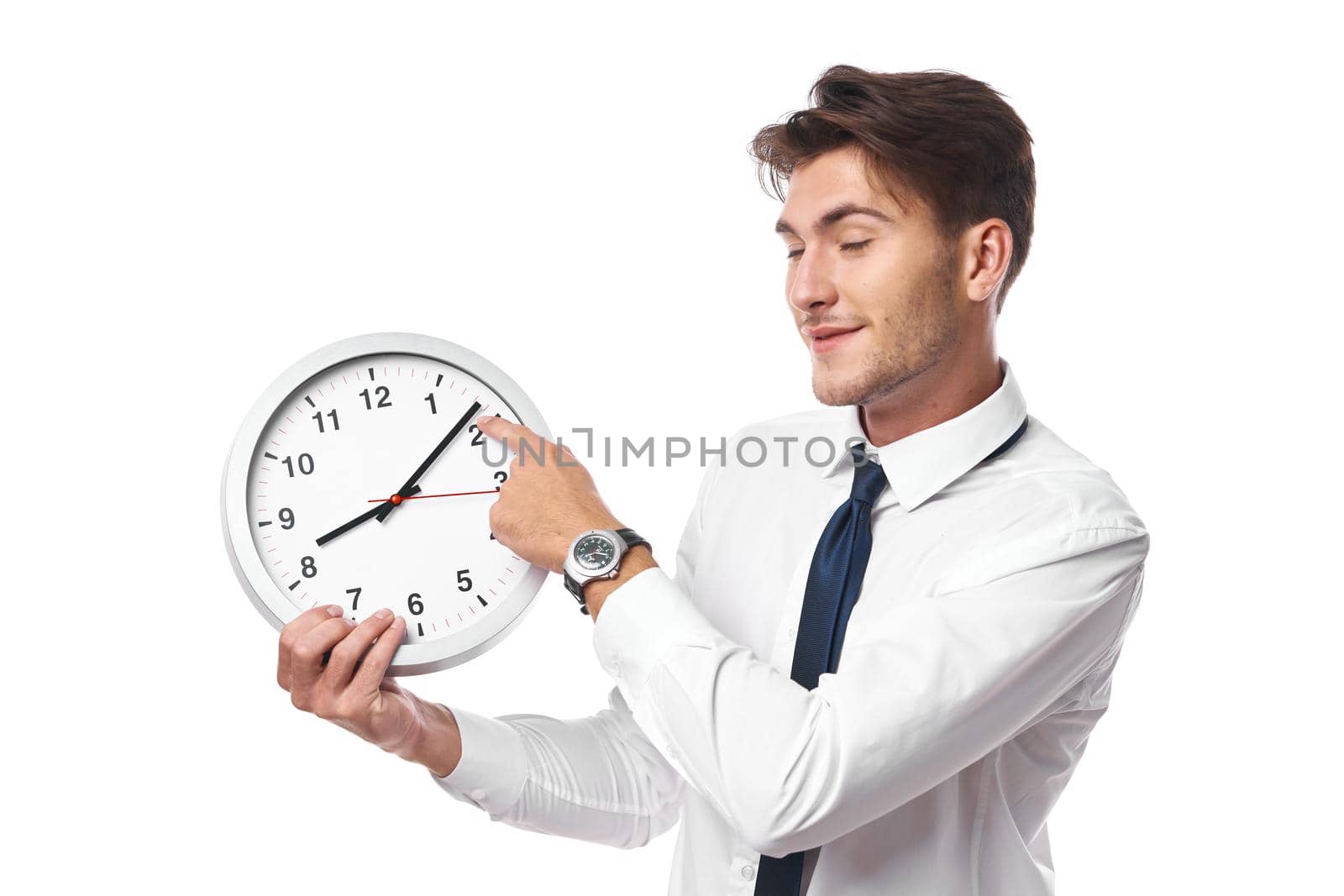 a person with clock in hand break office light background. High quality photo