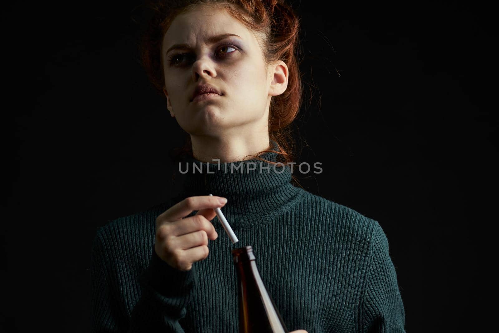 woman with cigarette bottle of alcohol bruises under eyes problems depression. High quality photo