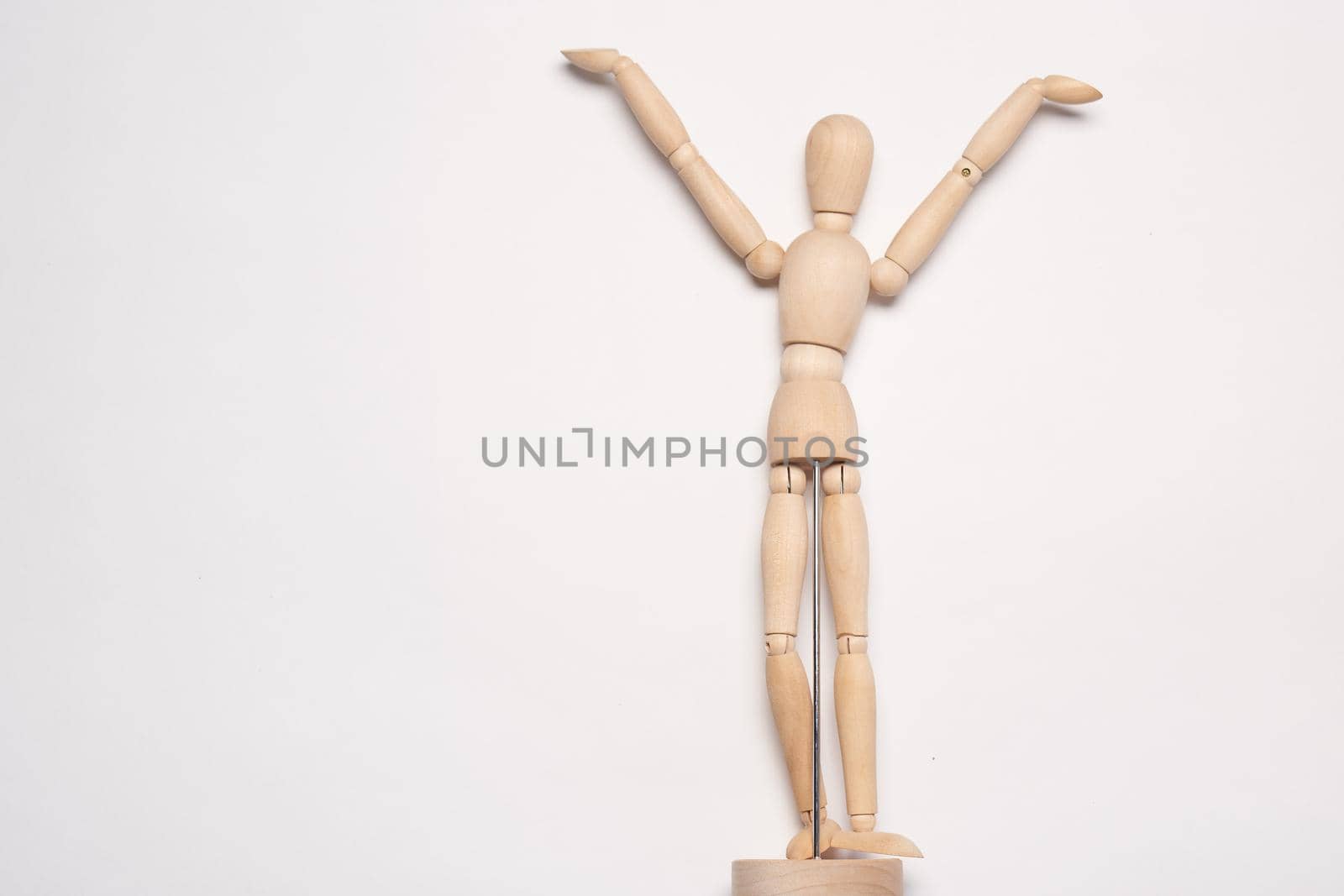 wooden man mannequin posing object light background by Vichizh