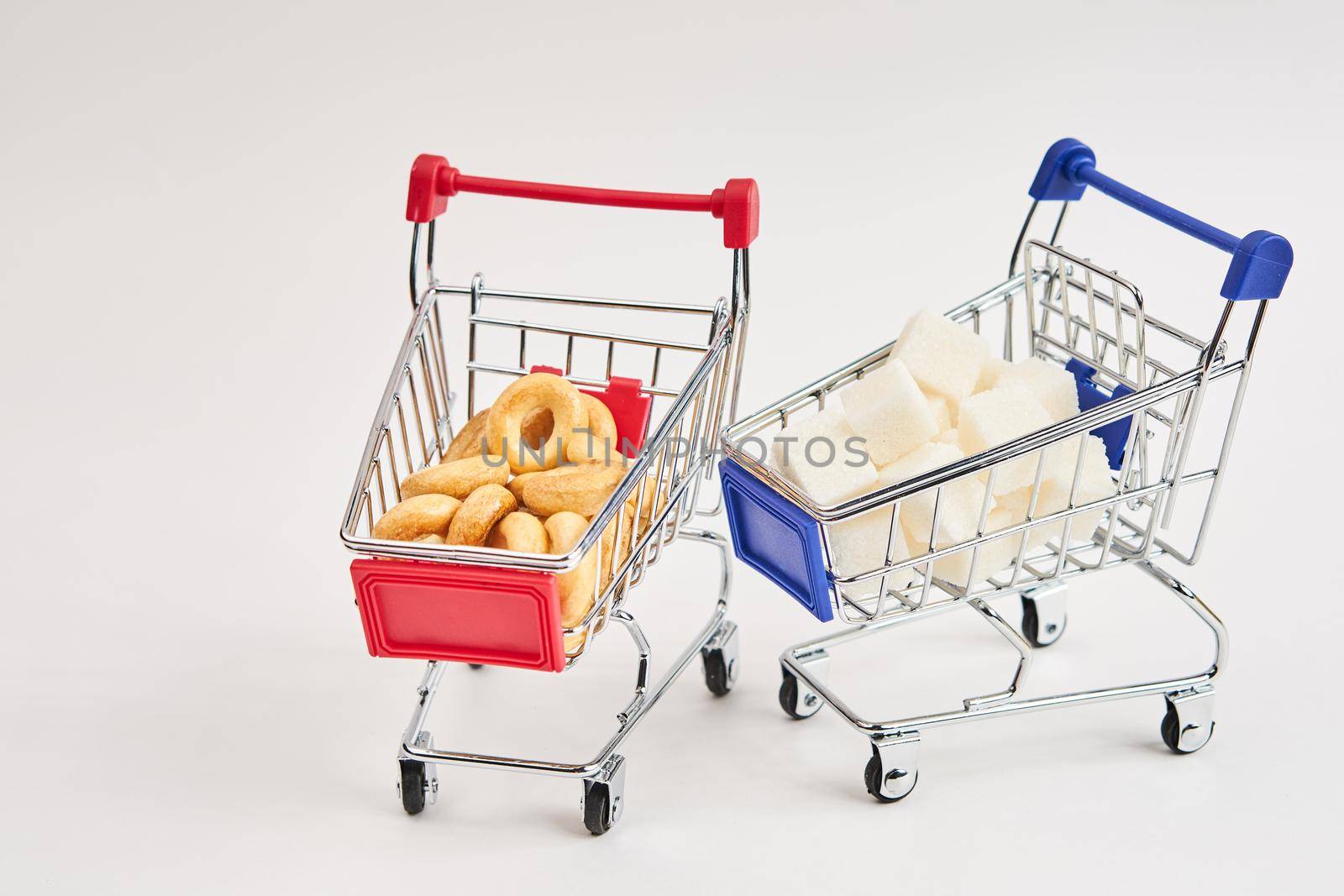 grocery carts supermarket shopping in the store by Vichizh