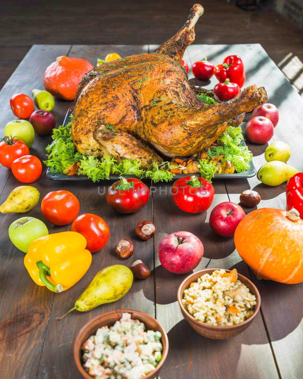 roasted turkey with vegetables wooden table. High quality photo by Zahard