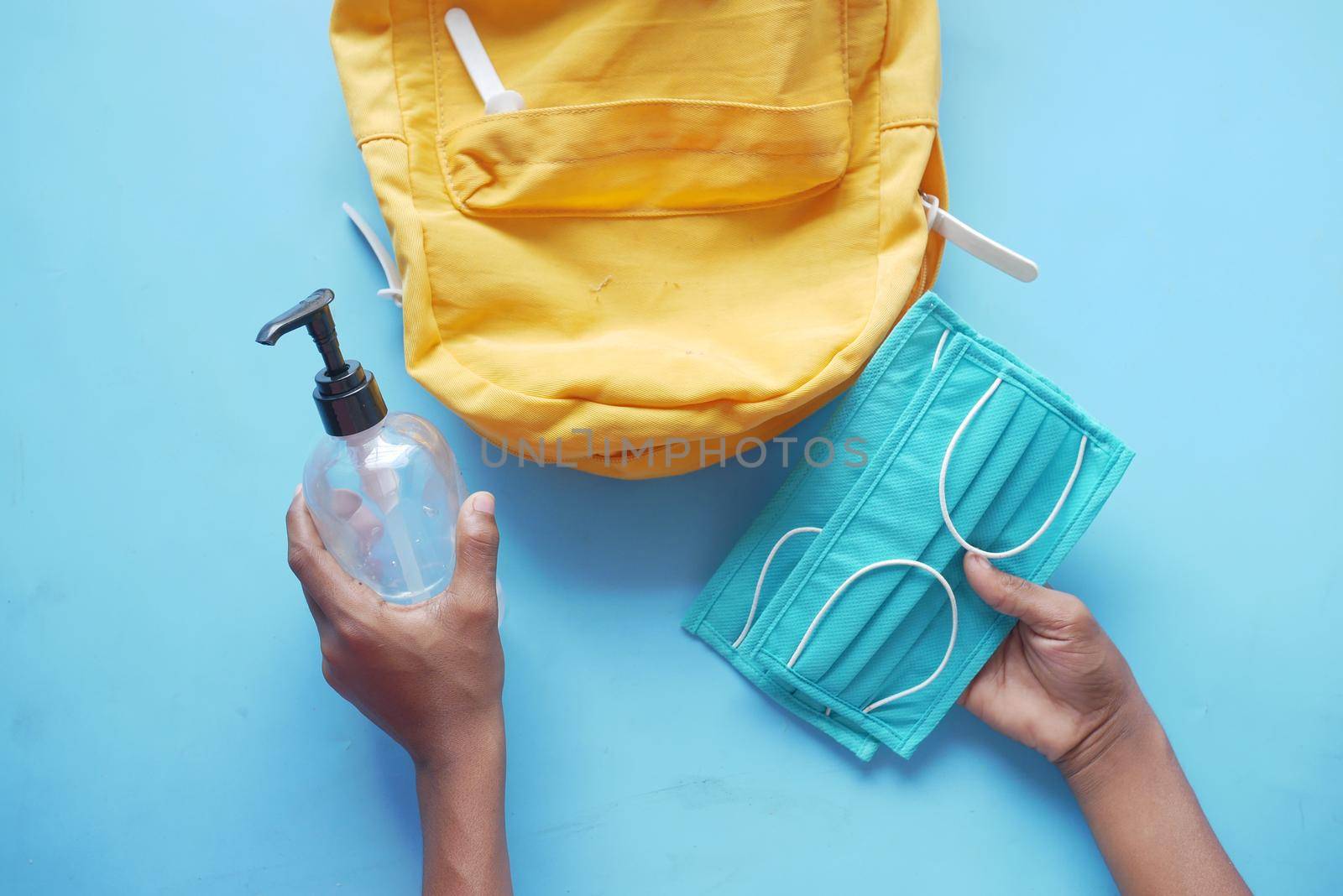 Student school bag pack with sanitizer, a face mask