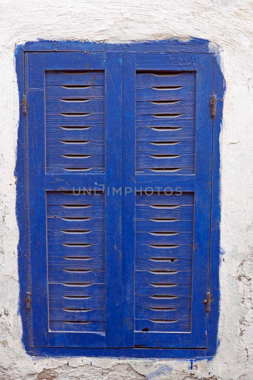 Old maroccan blue window in Essaouria Morocco by devy