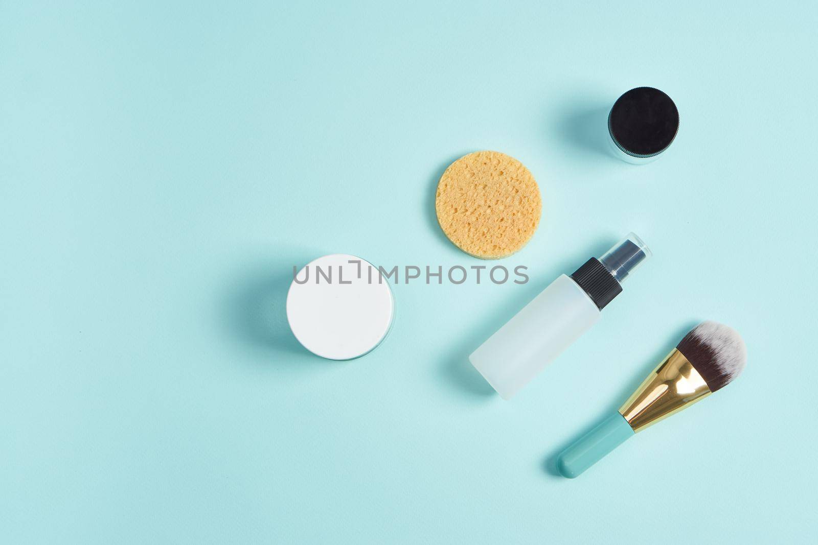 hygiene items cosmetics health procedures blue background by Vichizh