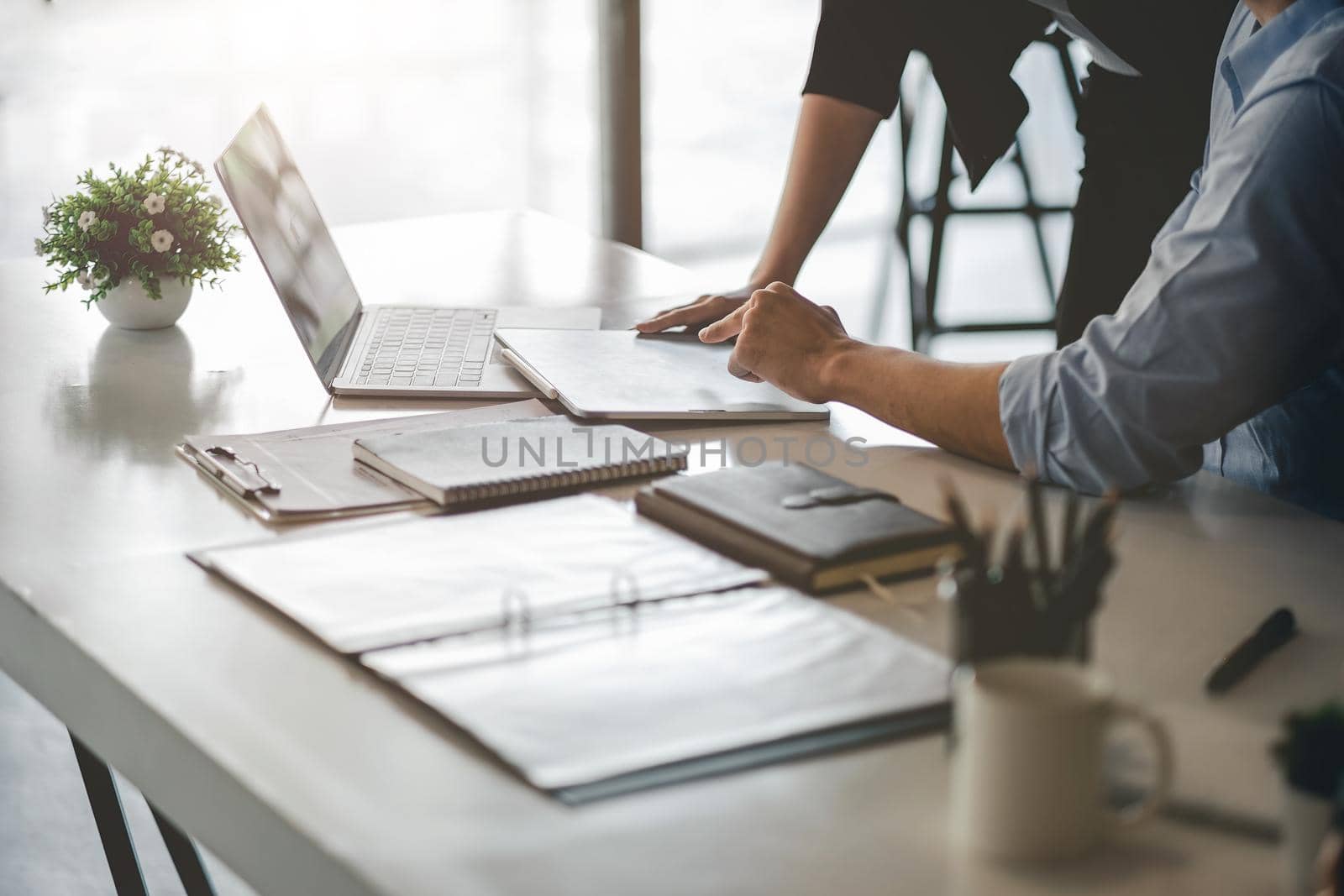 Business People Talking Discussing with coworker planning analyzing financial document data charts and graphs in Meeting and successful teamwork Concept.