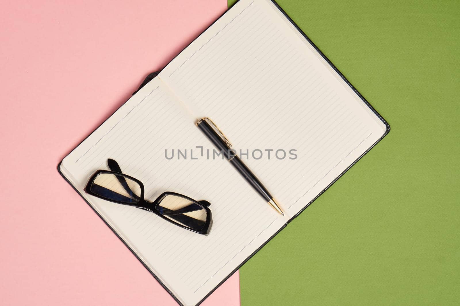notebook pen office business tools colorful background accessories. High quality photo